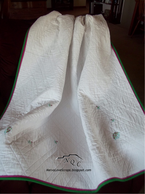 Melva's hand-embroidered tablecloth quilt from Week 19