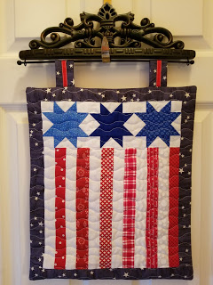 Kathy wallhanging from free pattern Moda Stripes and Stars pillow.jpg