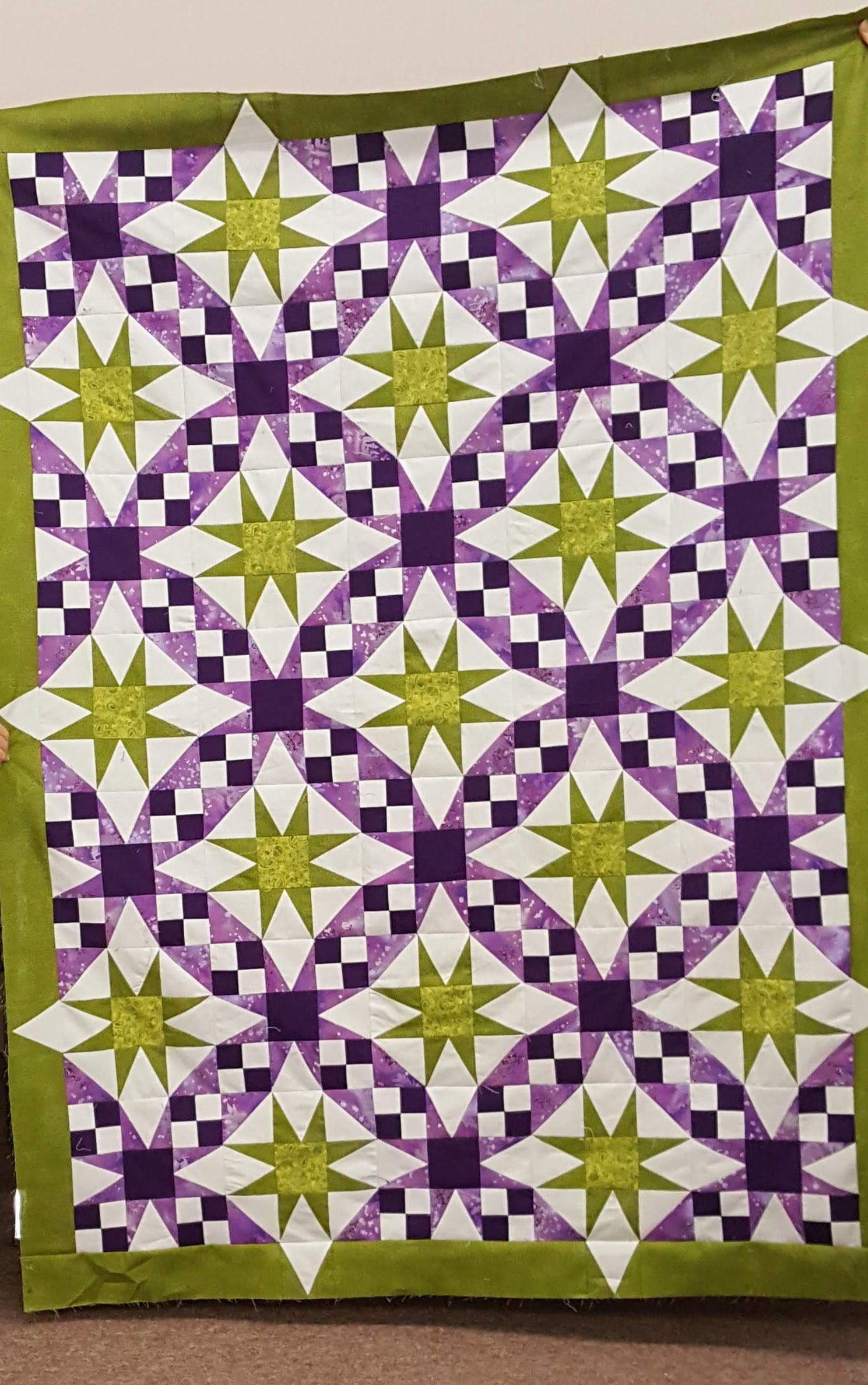 Yvonne purple-and-green-galaxy-quilt.jpg