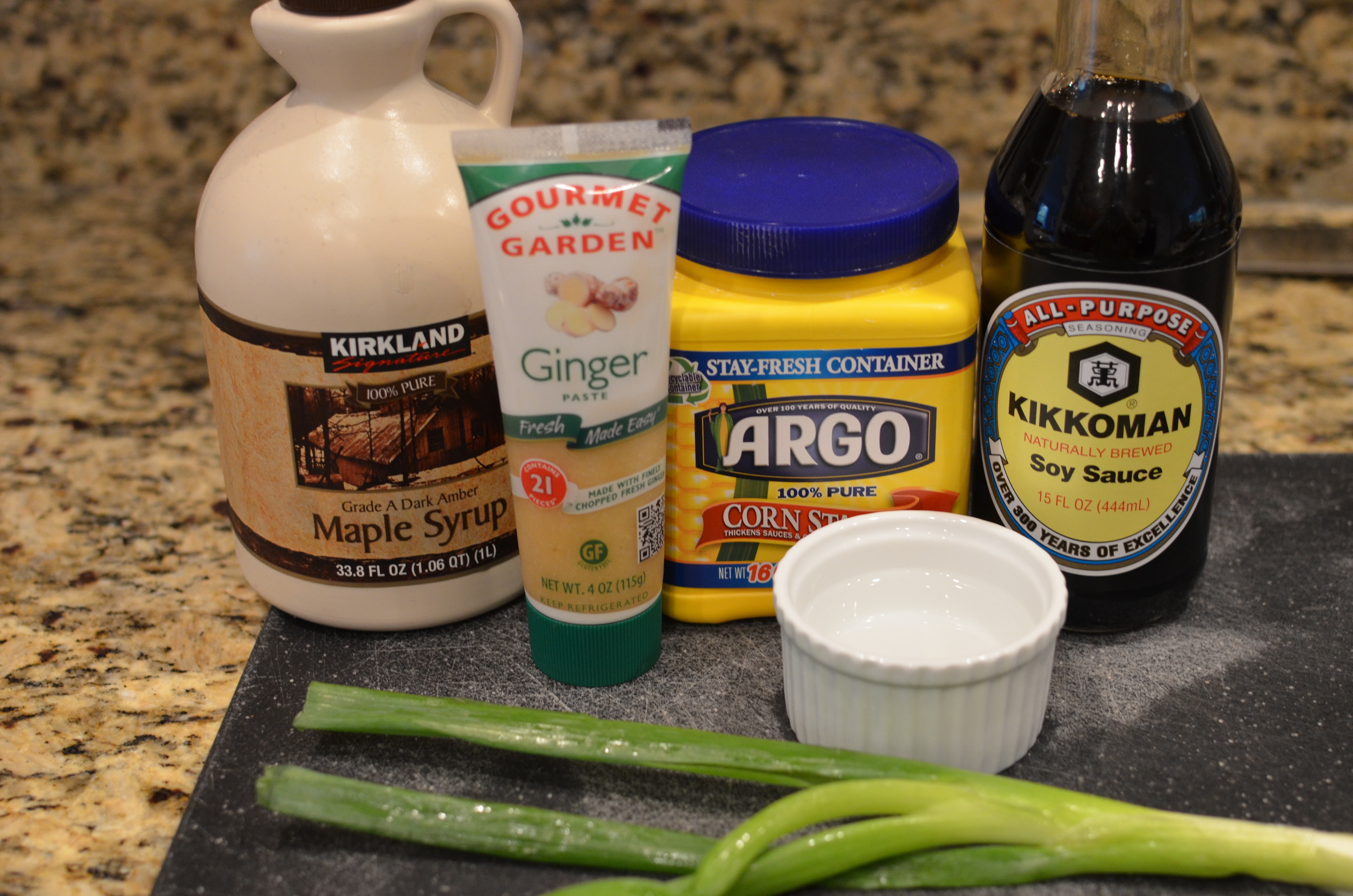 Gather the glaze ingredients - pure maple syrup, ginger, cornstarch, soy sauce, and water (reserve the scallion for later).