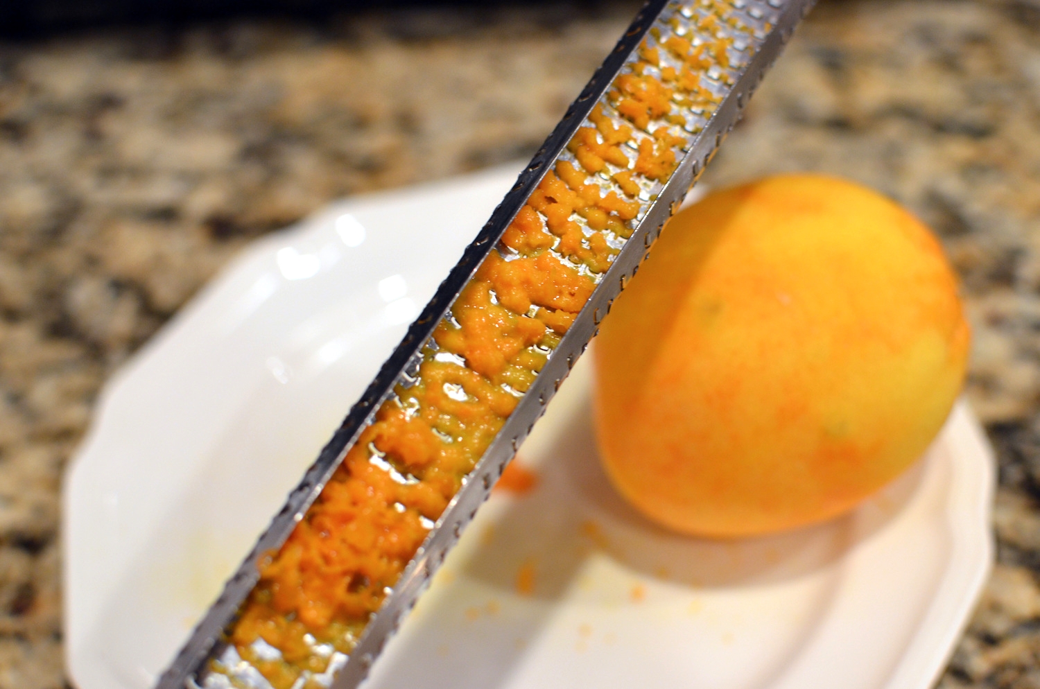 Zest an orange.