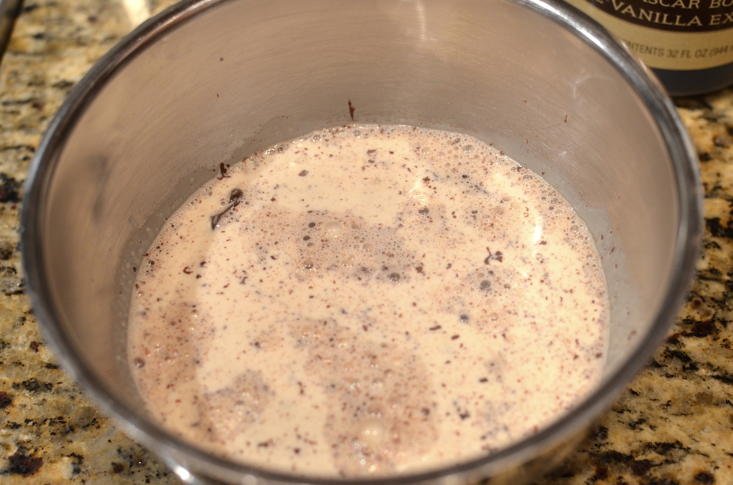 Pour cream over chocolate and let it sit for a few minutes.