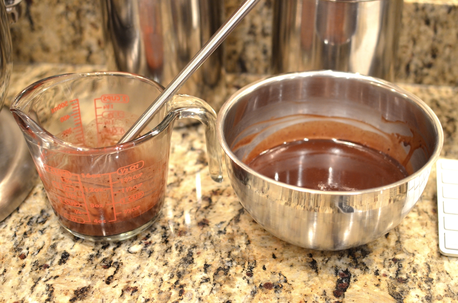 Set aside to cool. Cocoa mixture on left. Chocolate ganache mixture on right.