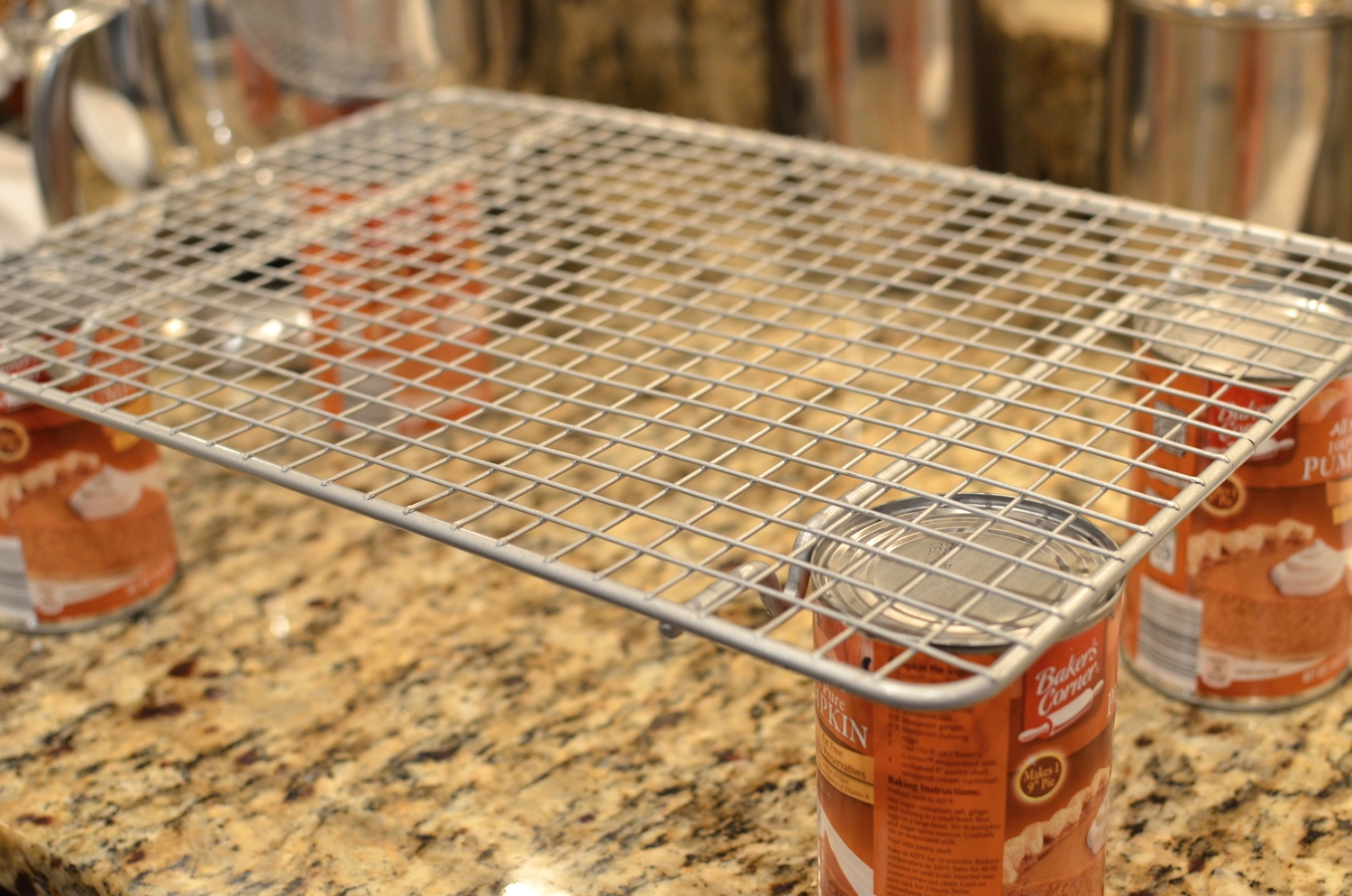 Elevate a nonstick cooling rack to allow for ample air circulation while the cake cools. If you don't have a nonstick cooling rack, spray a standard cooling rack with nonstick cooking spray.