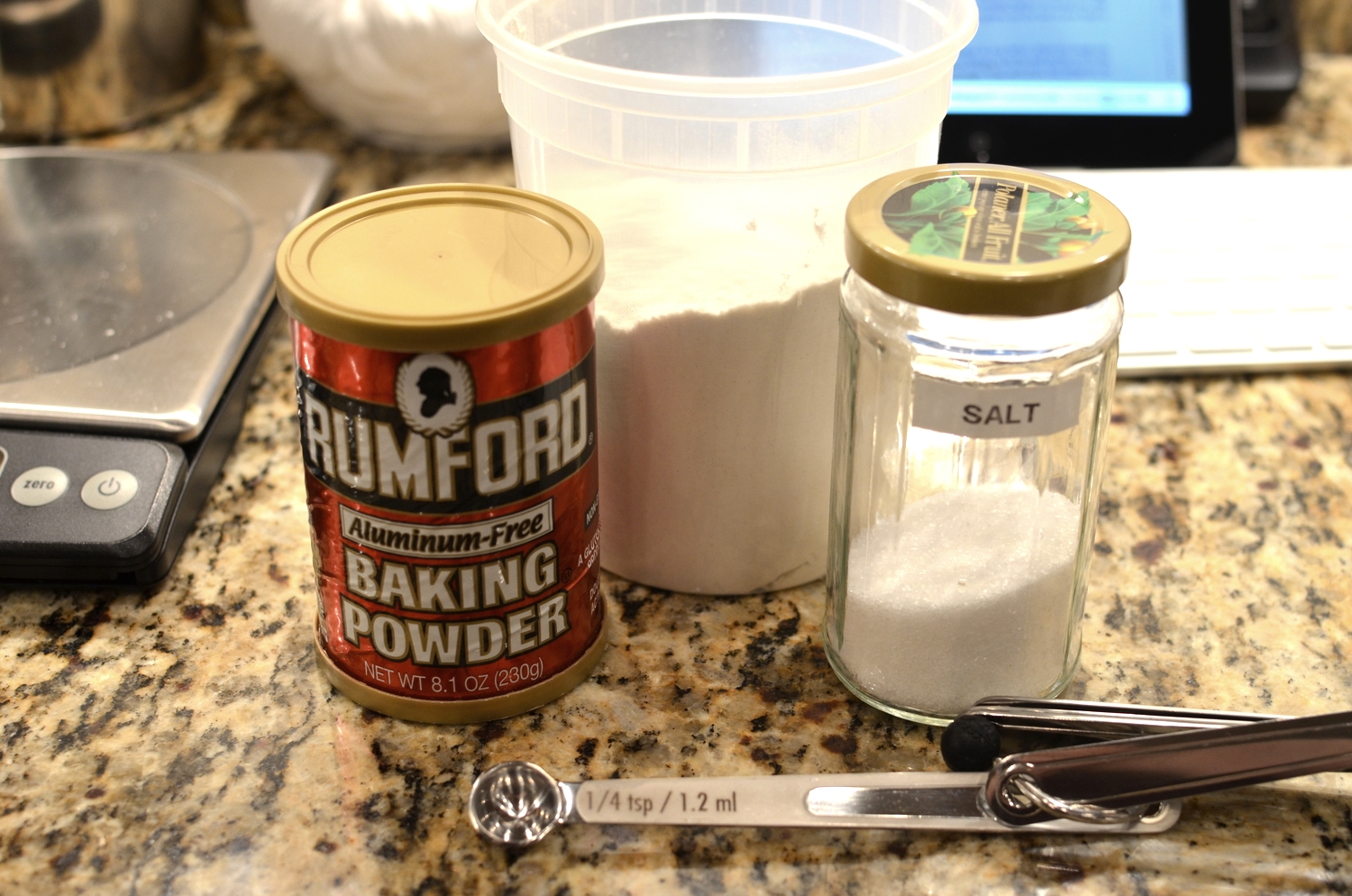 Okay, for the crust we start by chilling flour, baking powder, and salt. To make this crust by hand, put the chilled the flour, baking powder, and salt in a mixing bowl and add the cream cheese.