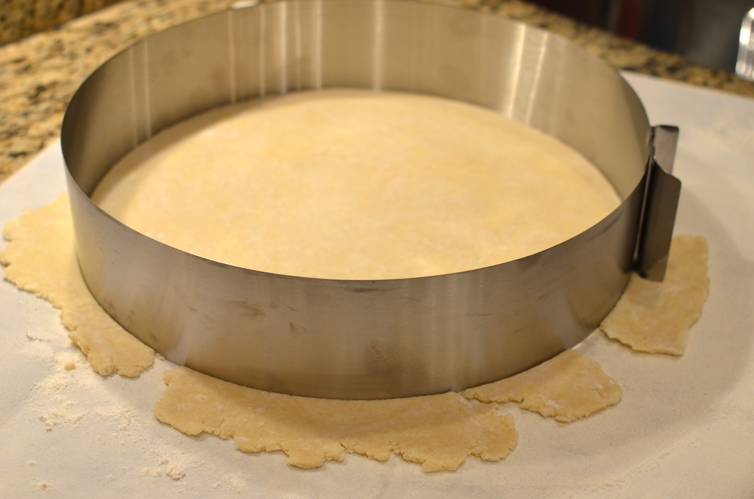 I used an expandable cake ring to cut the dough to a 12-inch diameter circle.