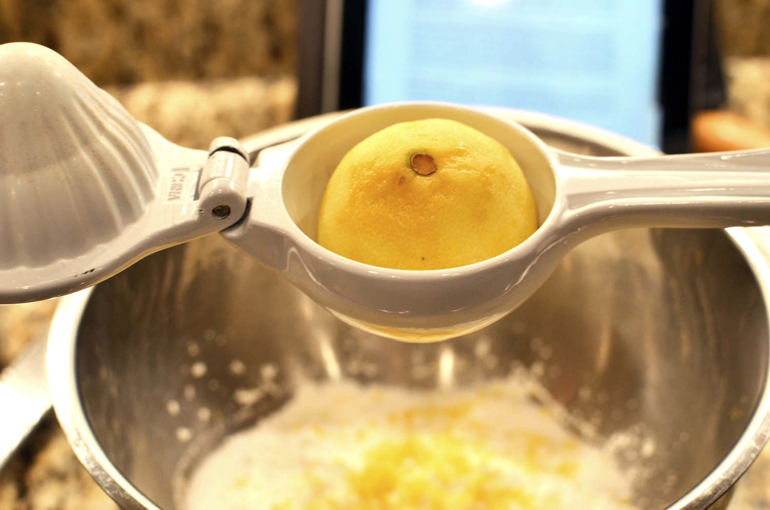 We're going to add freshly squeezed lemon juice too. Do you have a citrus juicer yet? Awesome kitchen tool. Be sure to place the fruit in cut side DOWN. 