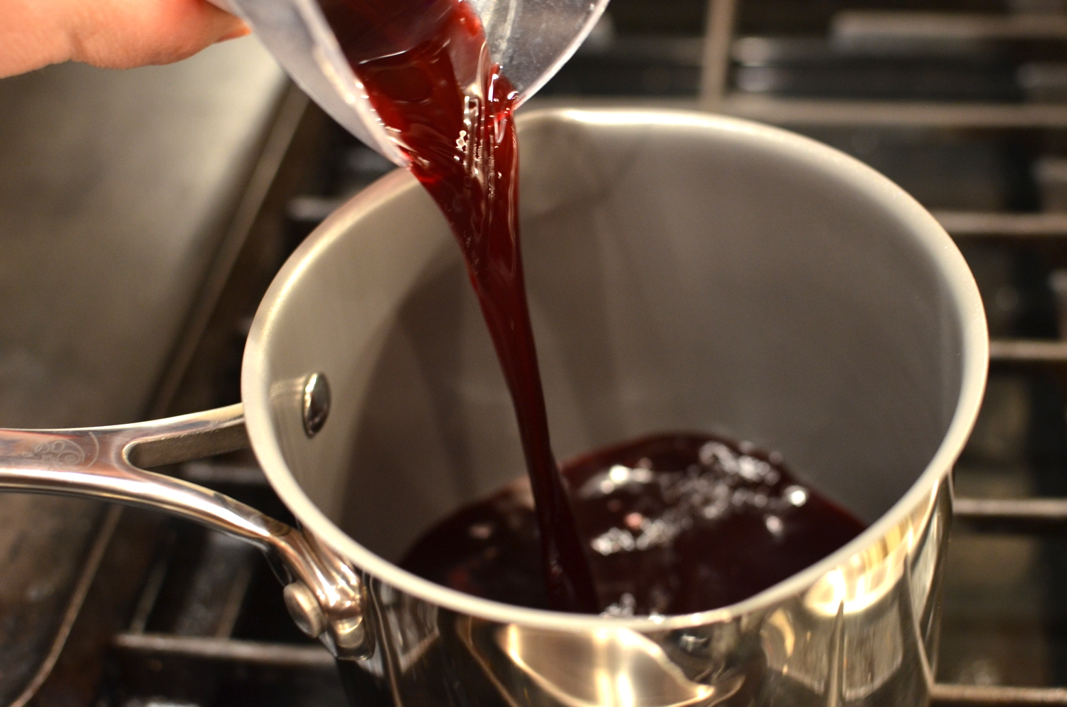 Pour the juice into a heavy bottom saucepan. Over medium to medium-high heat, allow the juice to boil slowly until reduced by half. Rose's caramel pot worked very well.