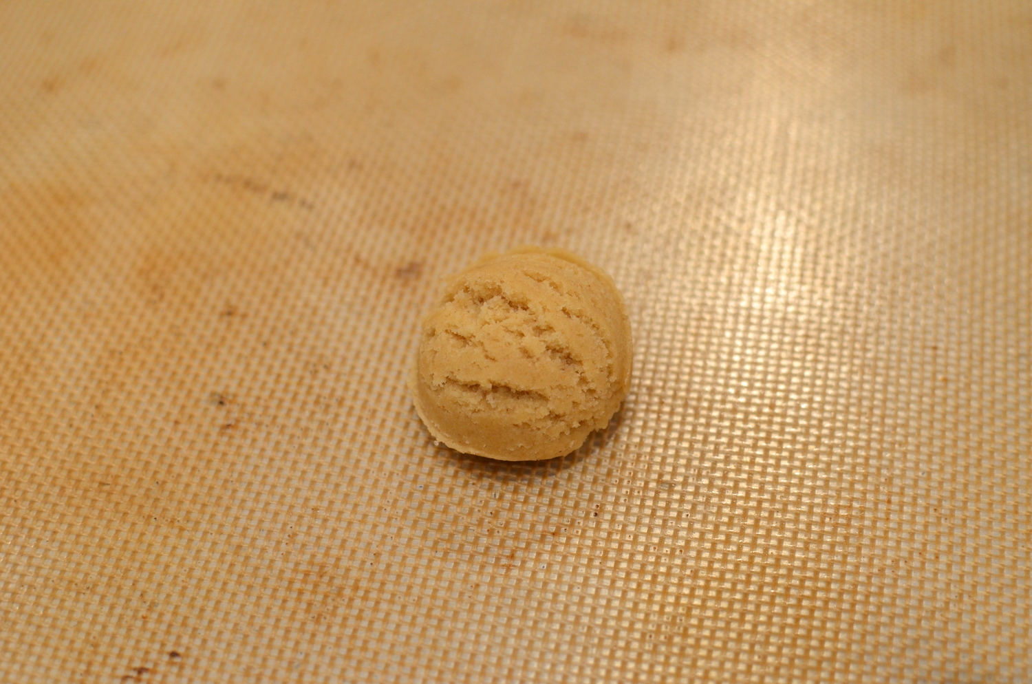 Let the cookie dough warm a bit at room temperature if it's too cold to scoop.