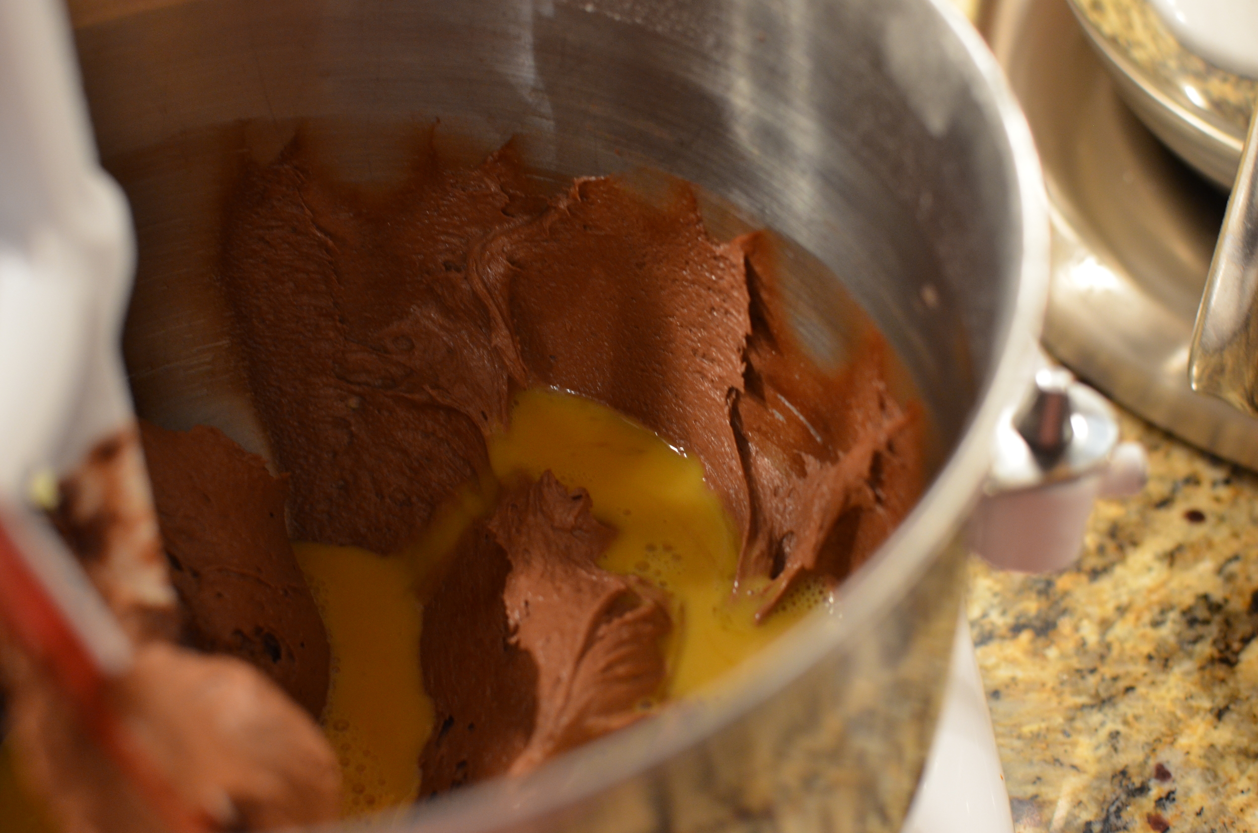 Next we add the egg mixture in two parts.