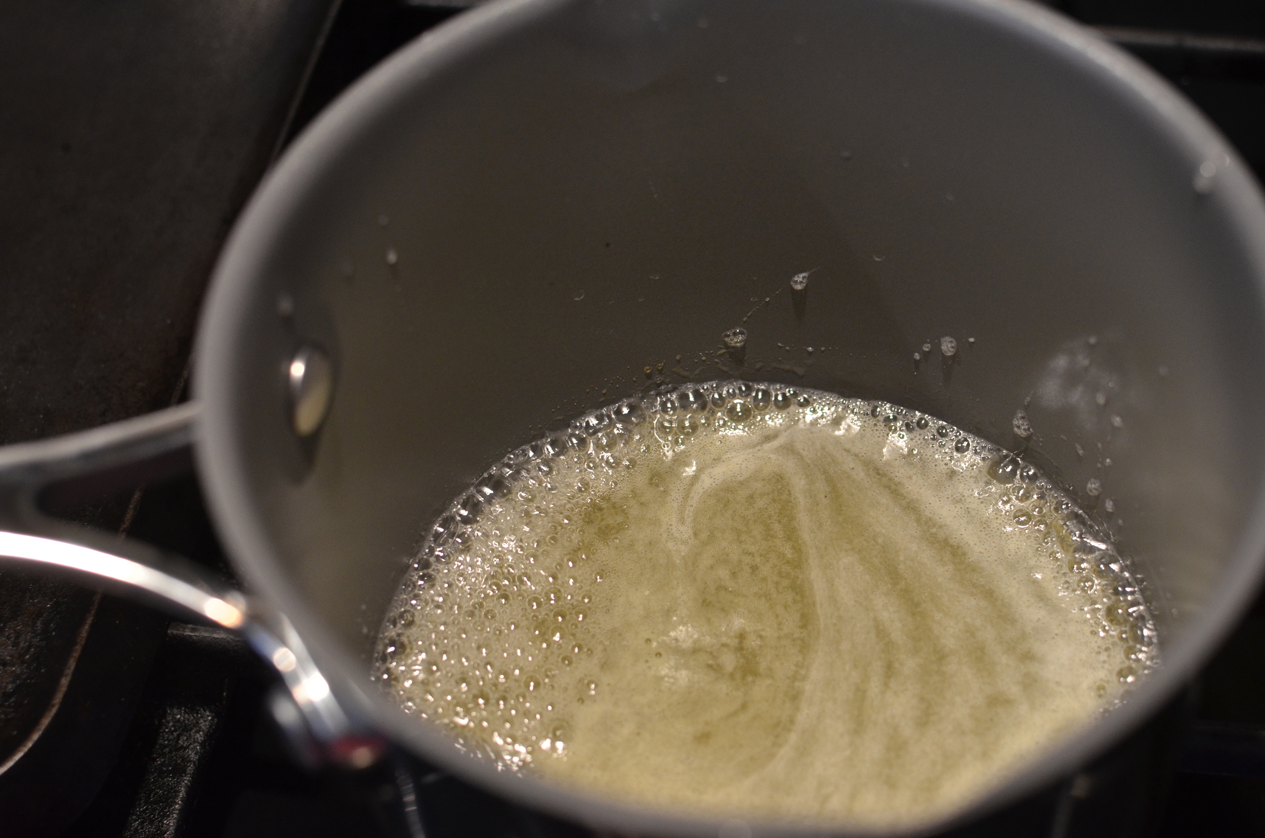 Right about the time the cream is ready, the lemon/sugar should just be reaching the boiling point. Turn off the heat.