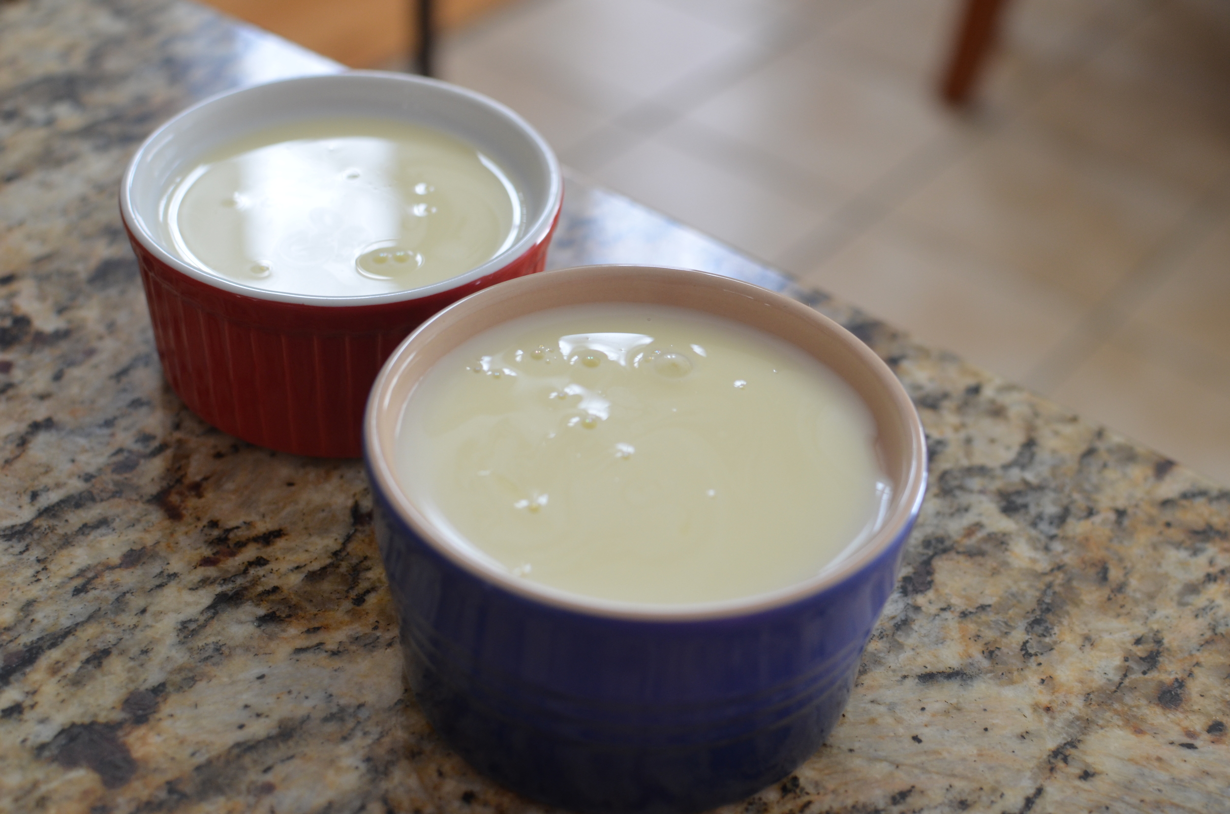 Pour the posset into ramekins. Here's a tip for getting rid of those pesky bubbles.