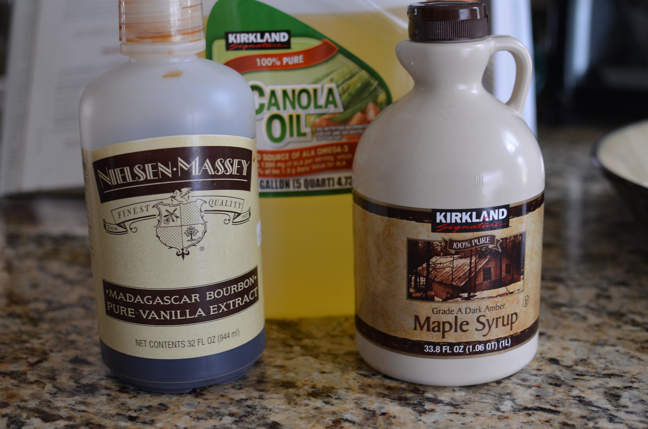 Next we're going to add the liquid ingredients - canola oil, pure maple syrup, and really good vanilla extract.