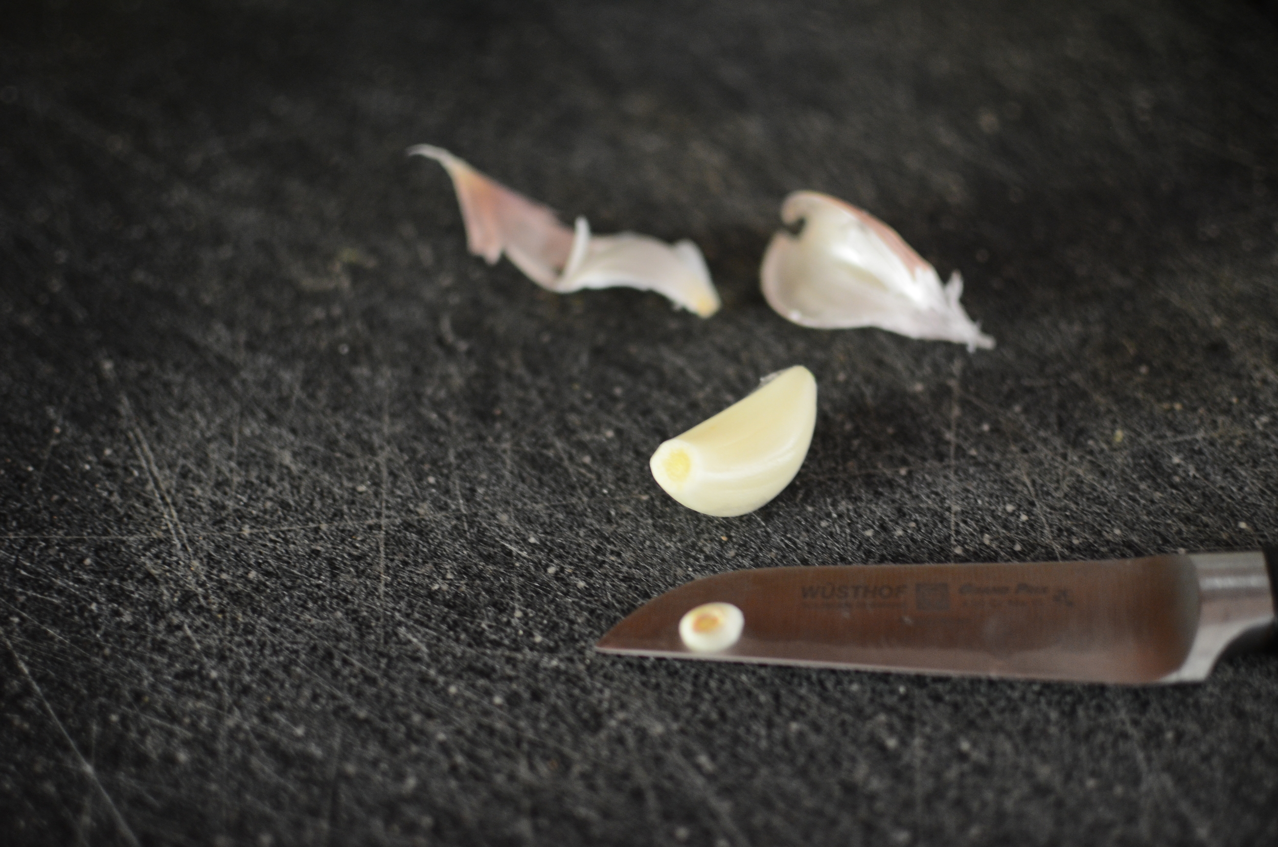 We start with a simple clove of garlic, peeled and root end removed.