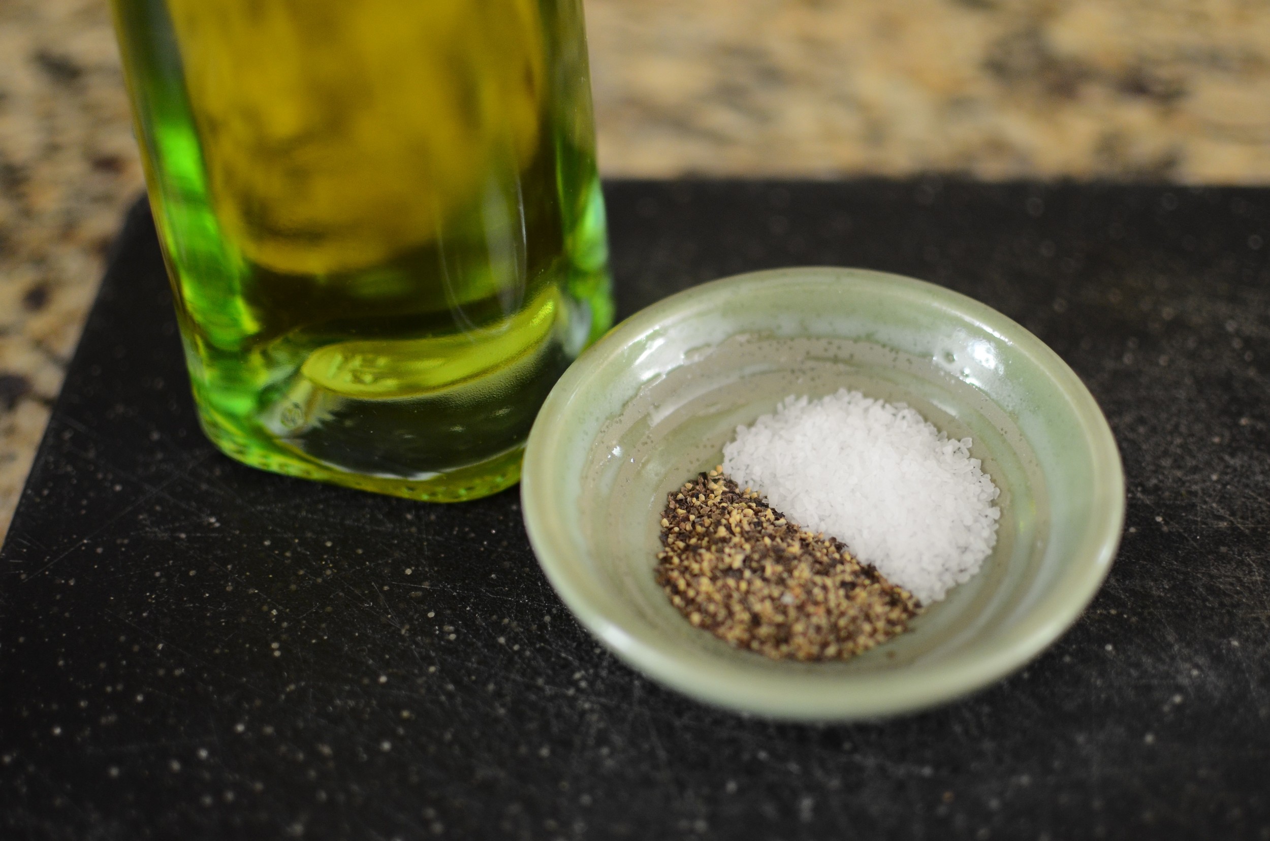 Now sprinkle the mashed avocado kosher salt and black pepper, and finish it off with a drizzle of your very best extra virgin olive oil. 