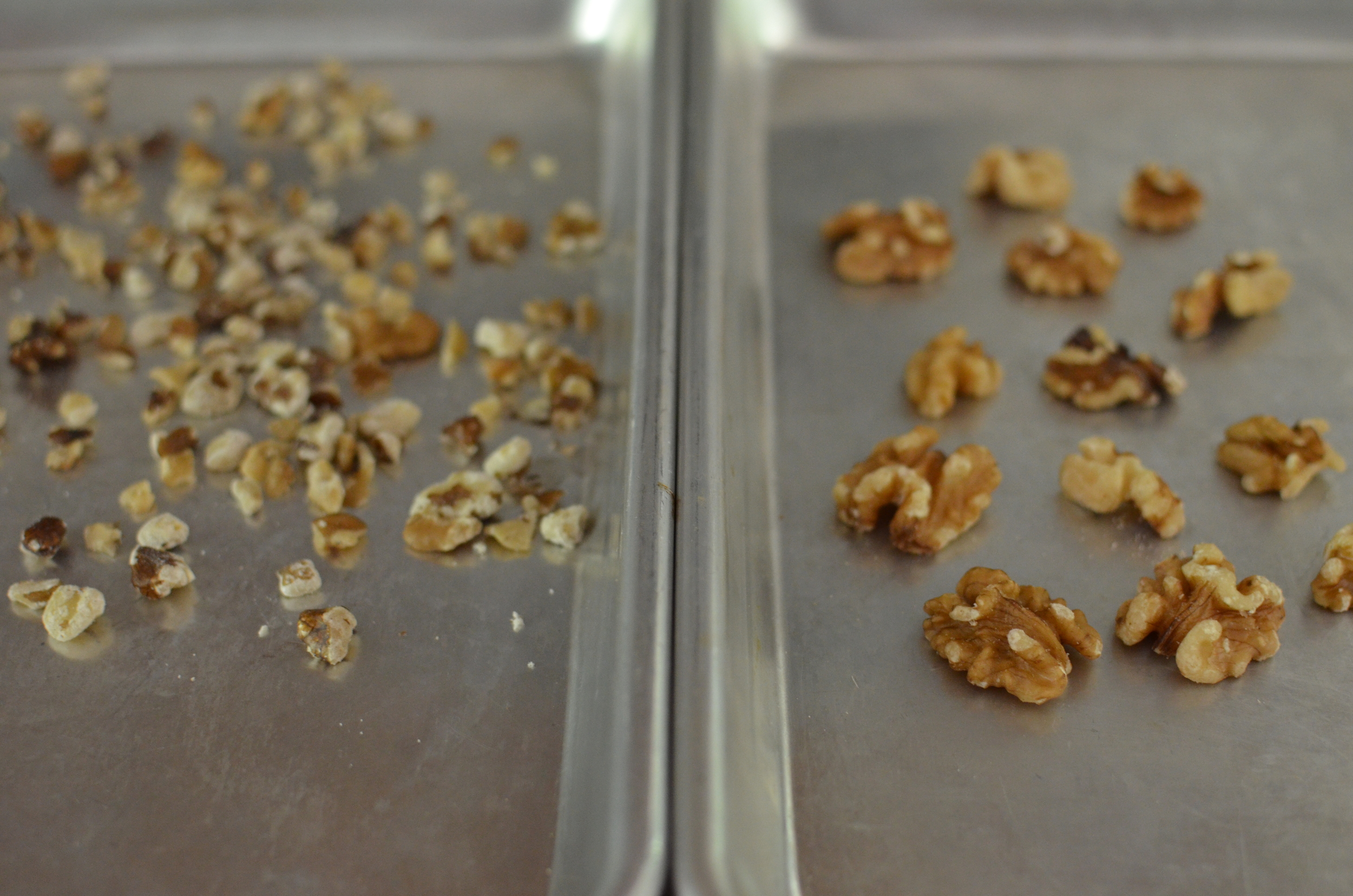 Black walnuts on the left. English walnuts on the right. Toast the nuts in the oven to intensify their flavor.