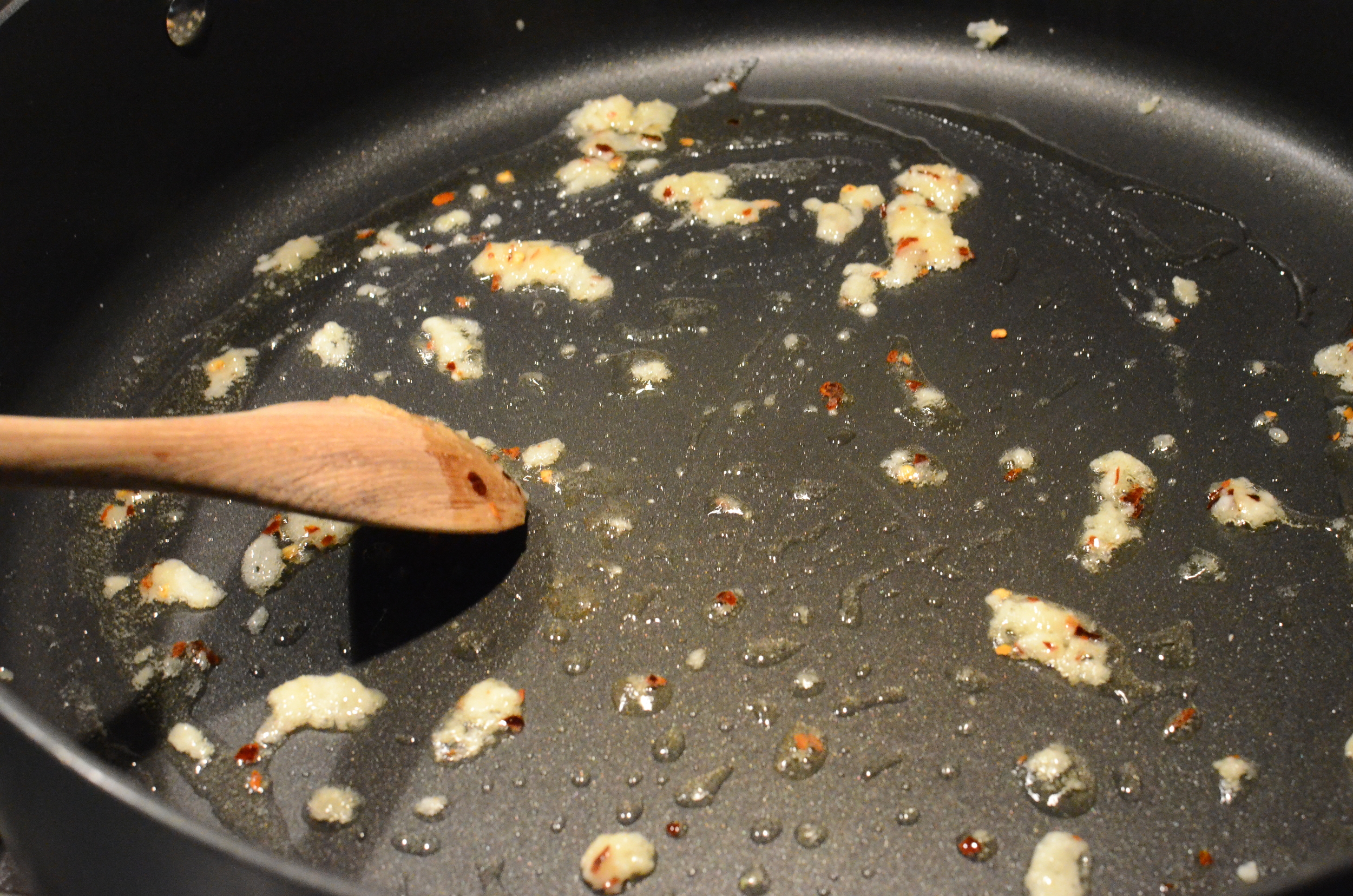 Stir constantly so the garlic doesn't burn. After 30-60 seconds you'll start smelling the garlic and ginger. 
