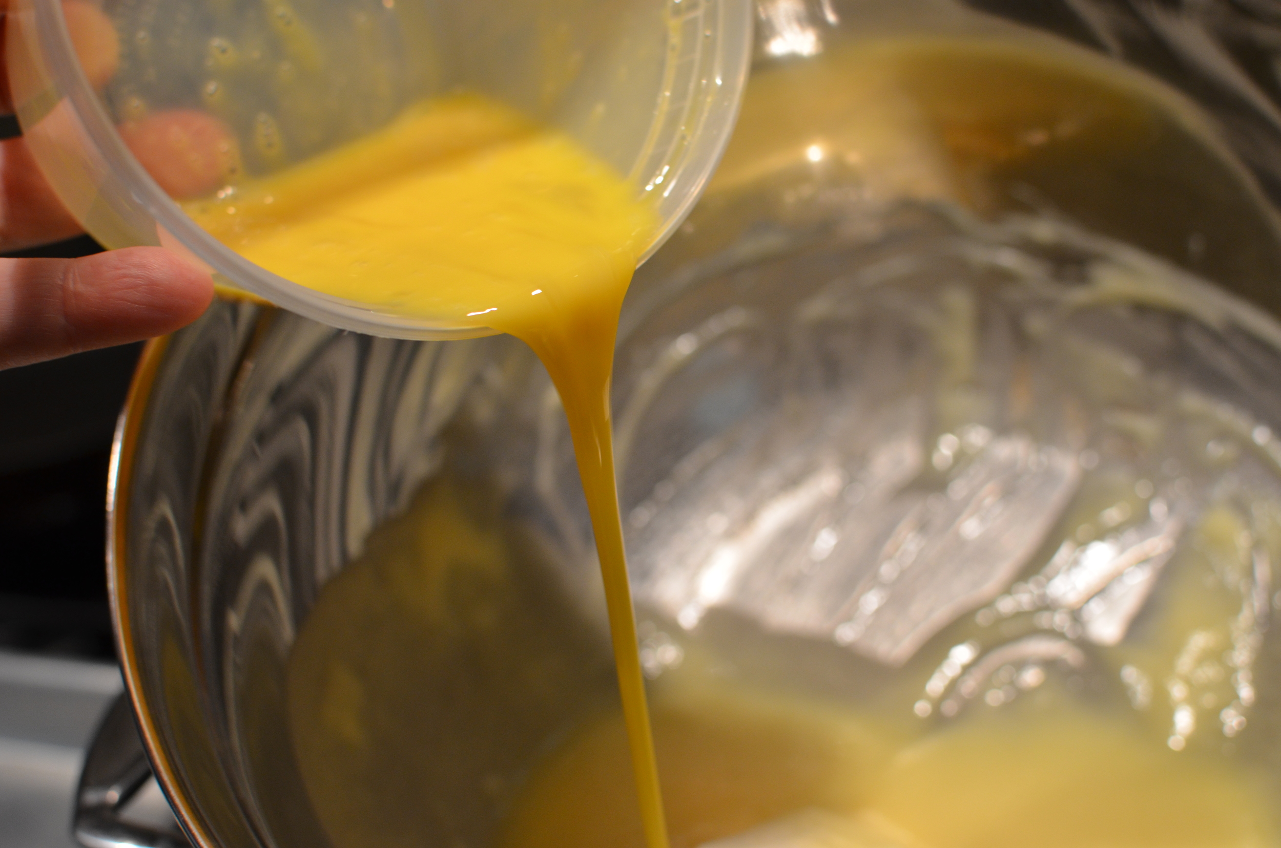 Stir constantly over the double boiler until the mixture thickens and reaches 160F. 