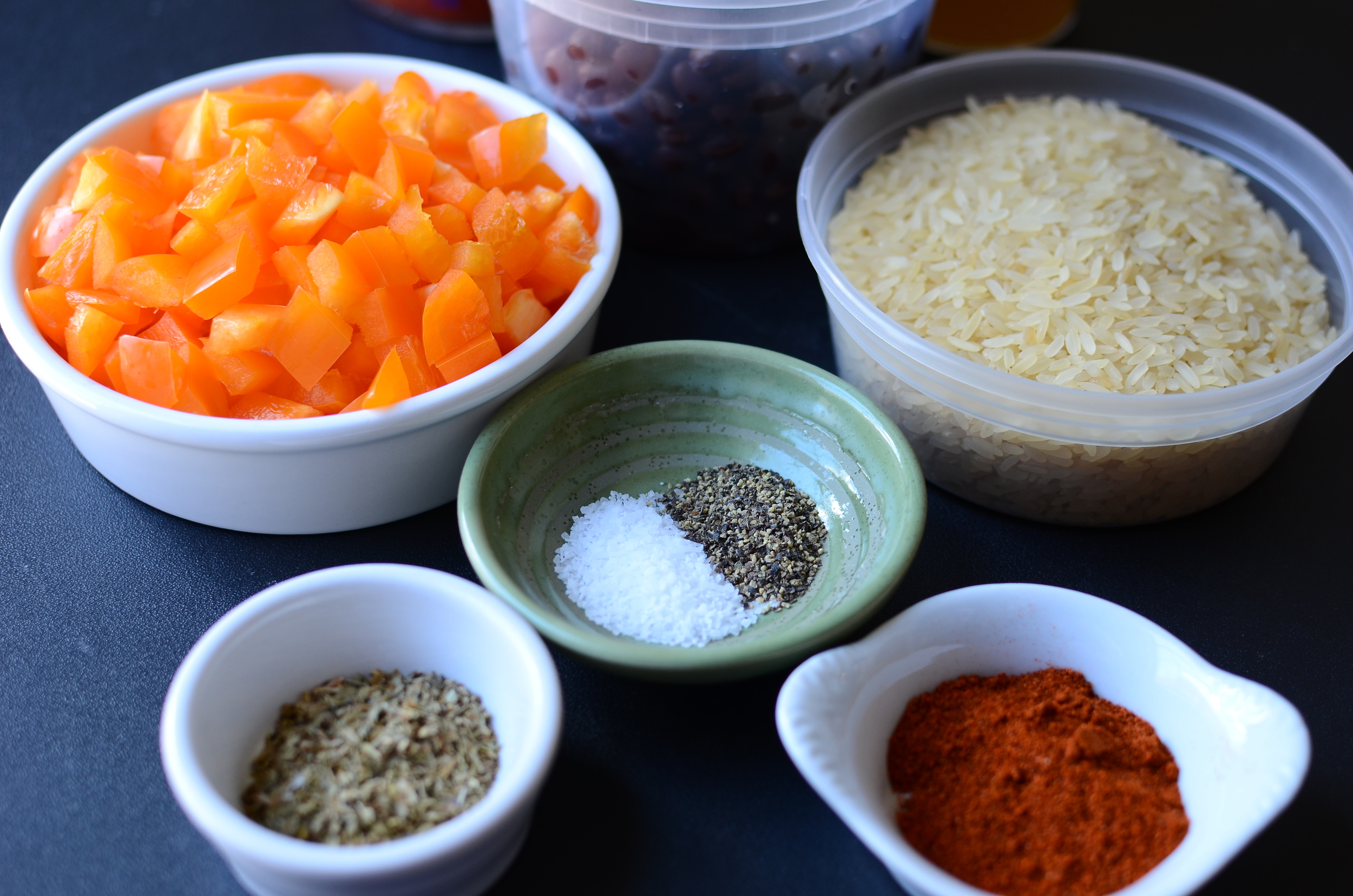 also chopped bell pepper, uncooked rice, dried oregano, kosher salt, pepper, and cayenne pepper.