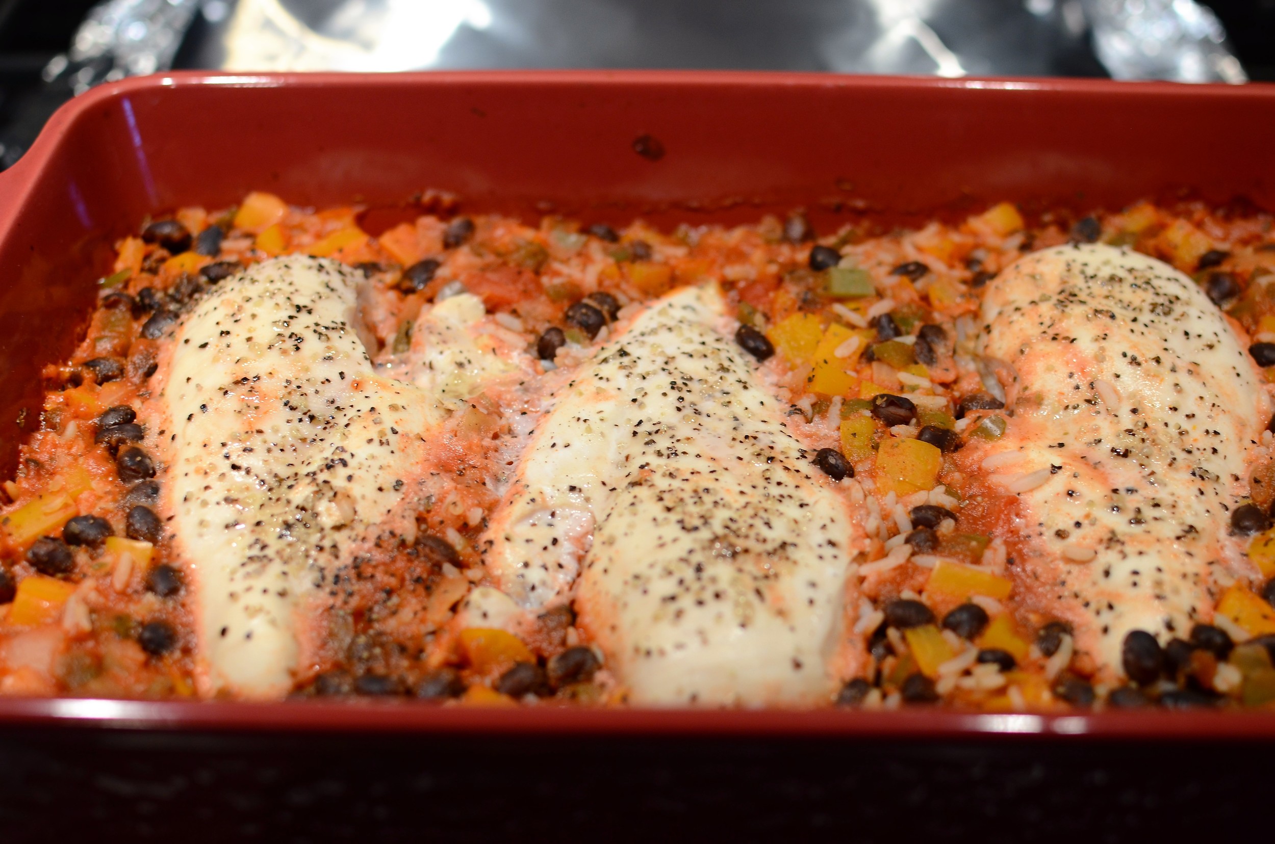 Cover the casserole dish with foil and bake until the chicken is just about done (about 160F).