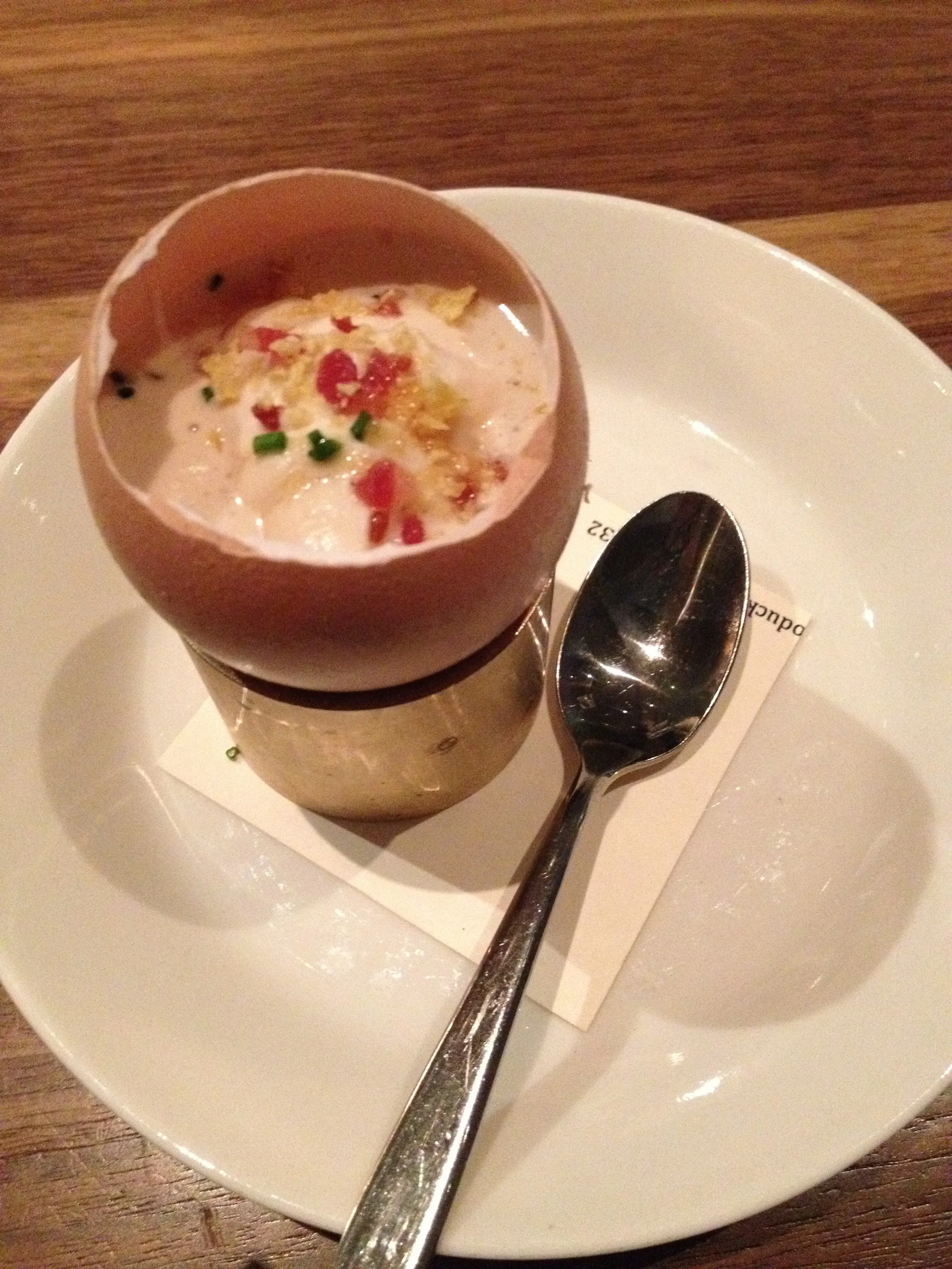 Breakfast in a Shell: coddled egg, semolina, pancetta, sherry cream, and maple syrup.