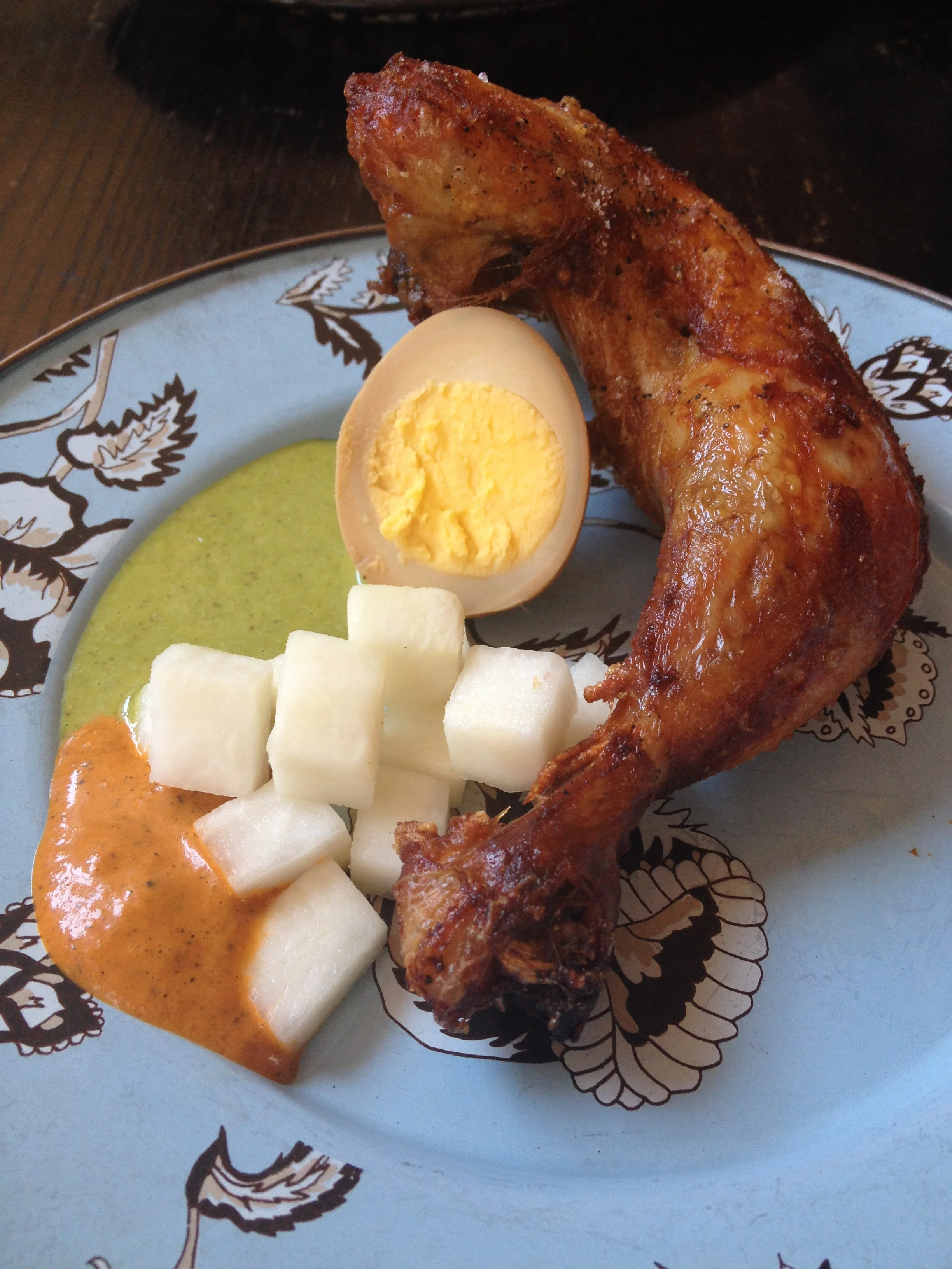 Cracklin' beer can chicken with kimchi, century egg (AMAZING), salsa roja, and salsa verde.