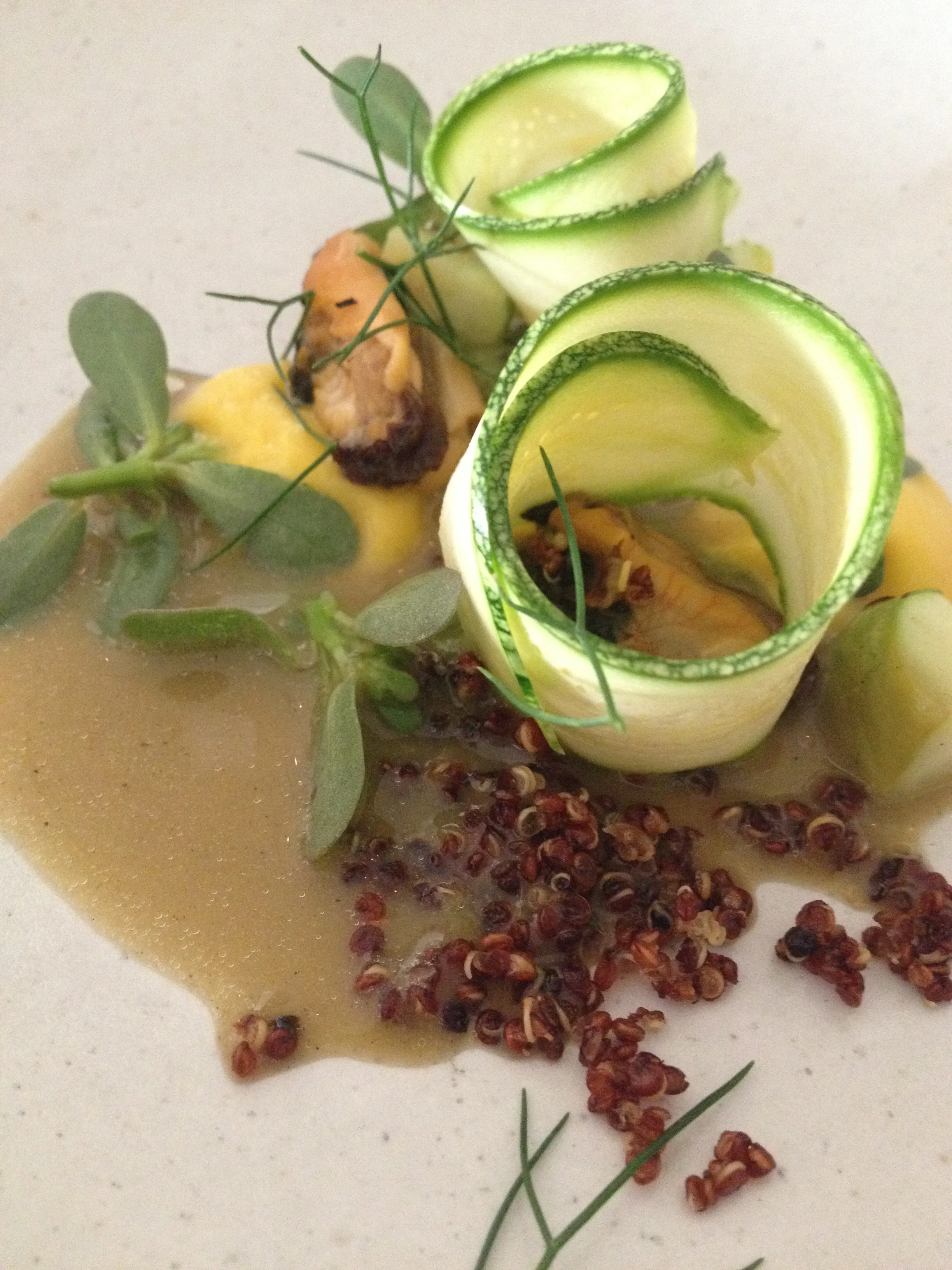 Bouillabaisse with mussels, zucchini, and squash.