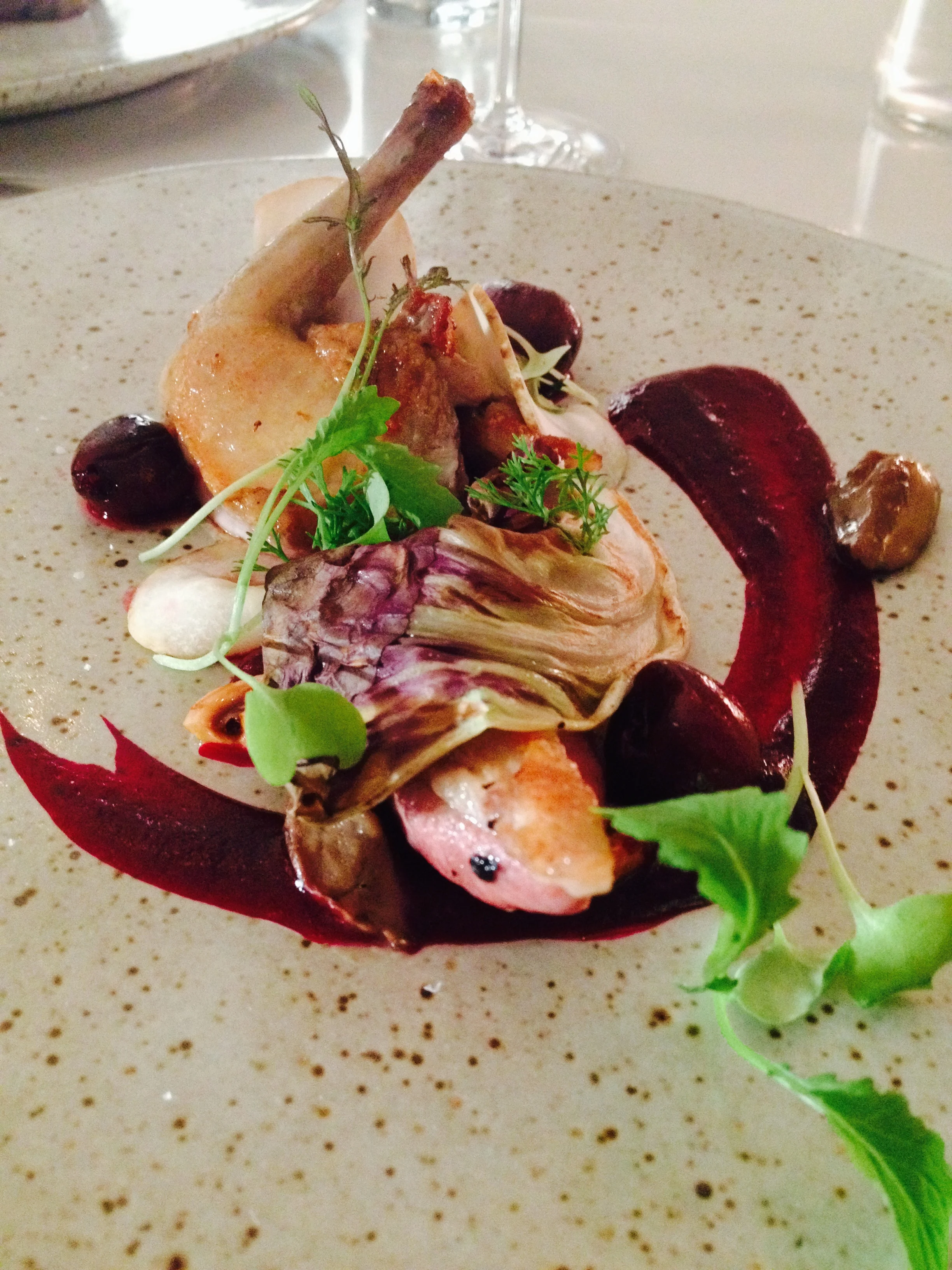 Pigeon with cherry, porcini mushrooms, and hazelnuts.