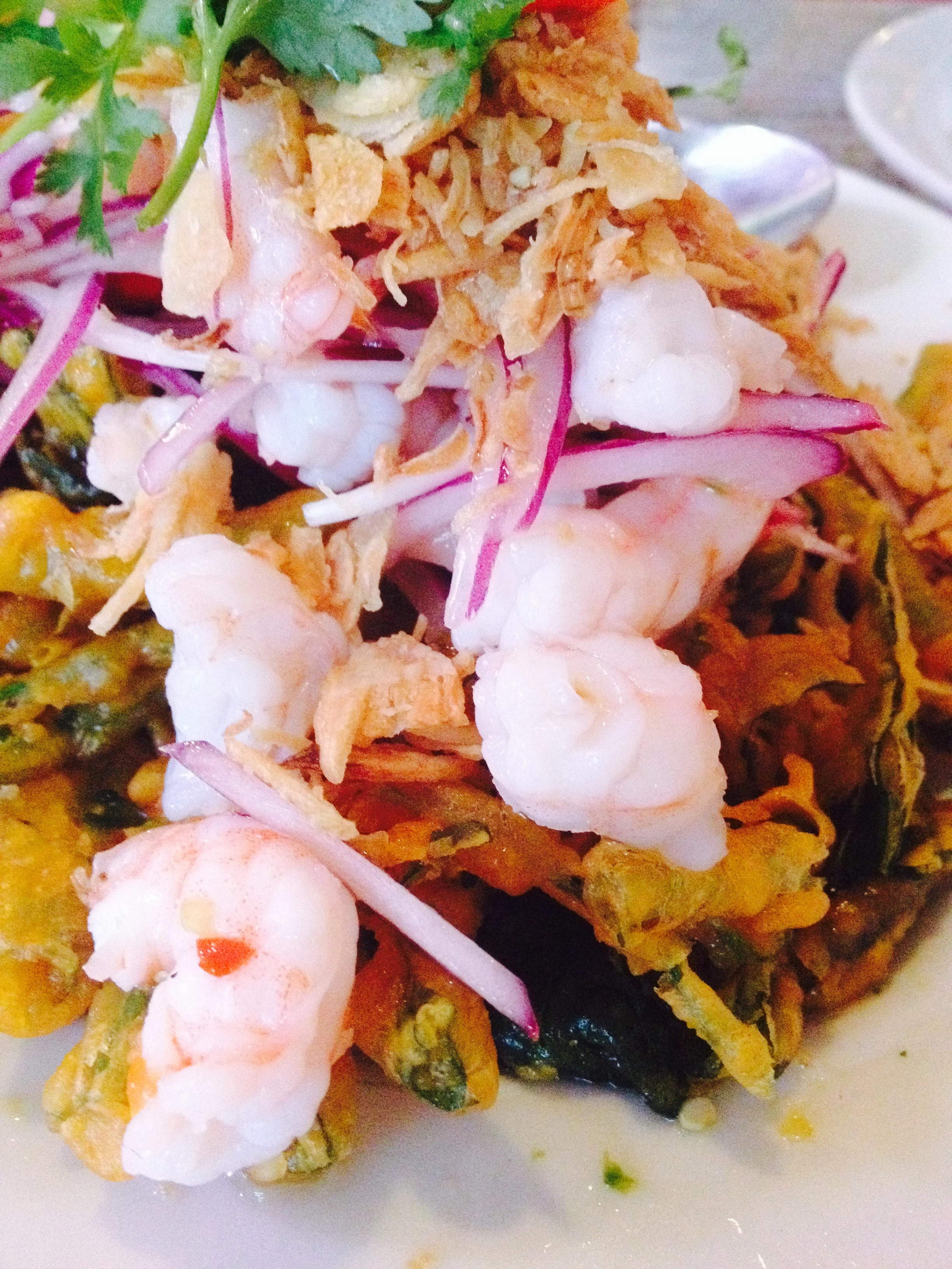 Deep fried Morning Glory topped with fresh shrimp and a spicy sauce dressing.