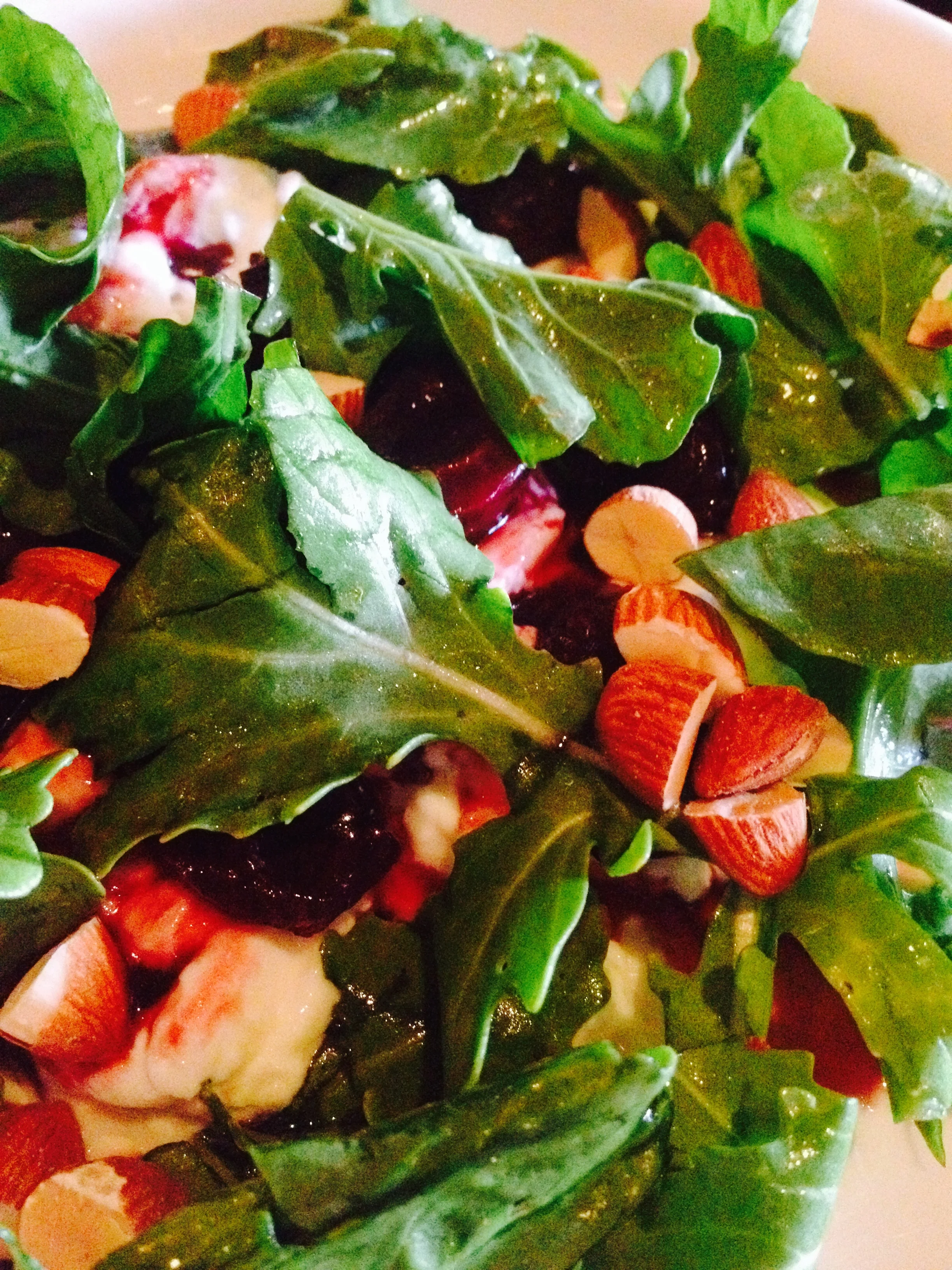 Balsamic roasted cherries, burrata, toasted almonds, and arugula.