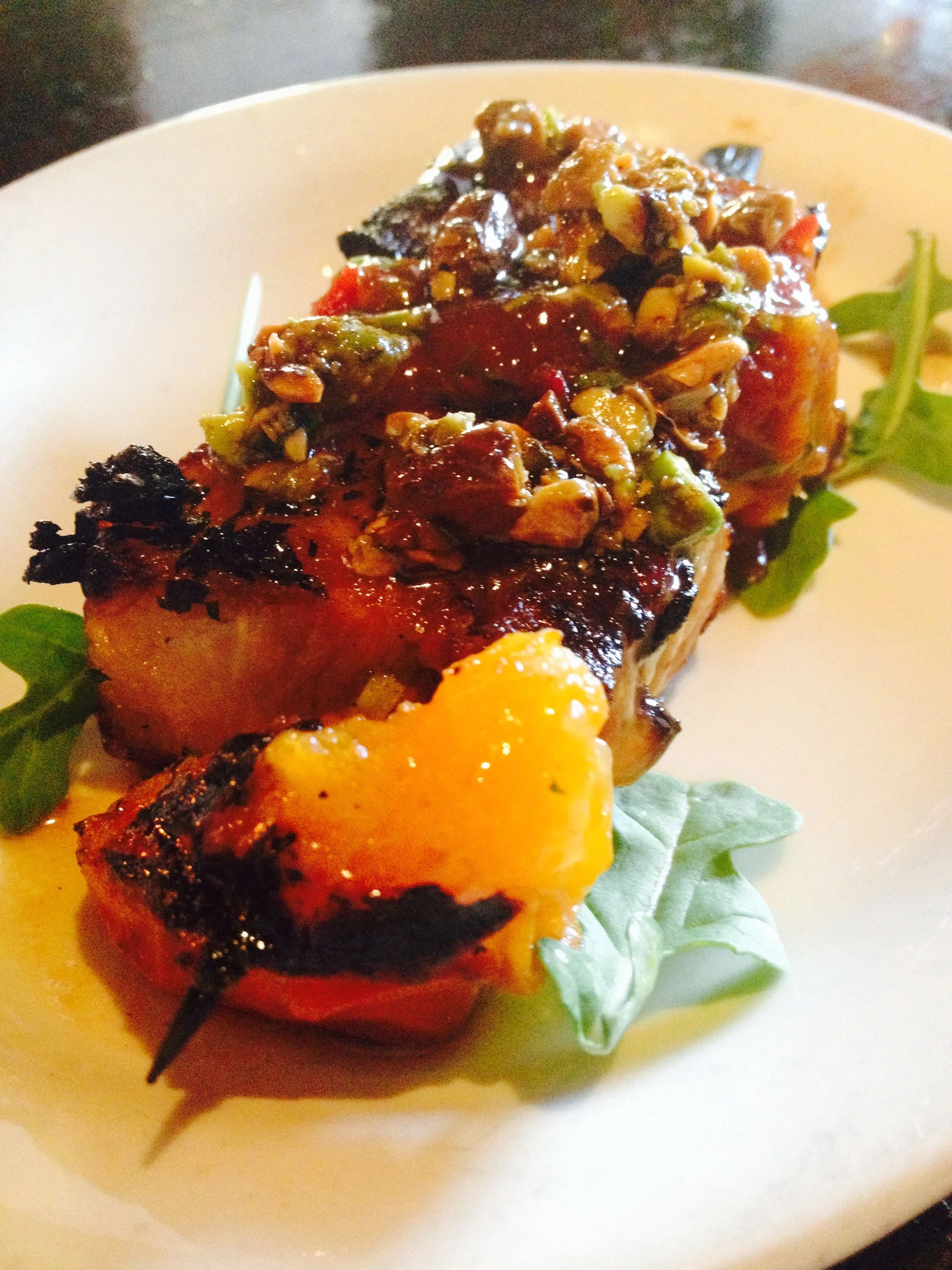 Grilled Pork Belly &amp; Apricot Skewer with spicy apricot chutney and pistachios.