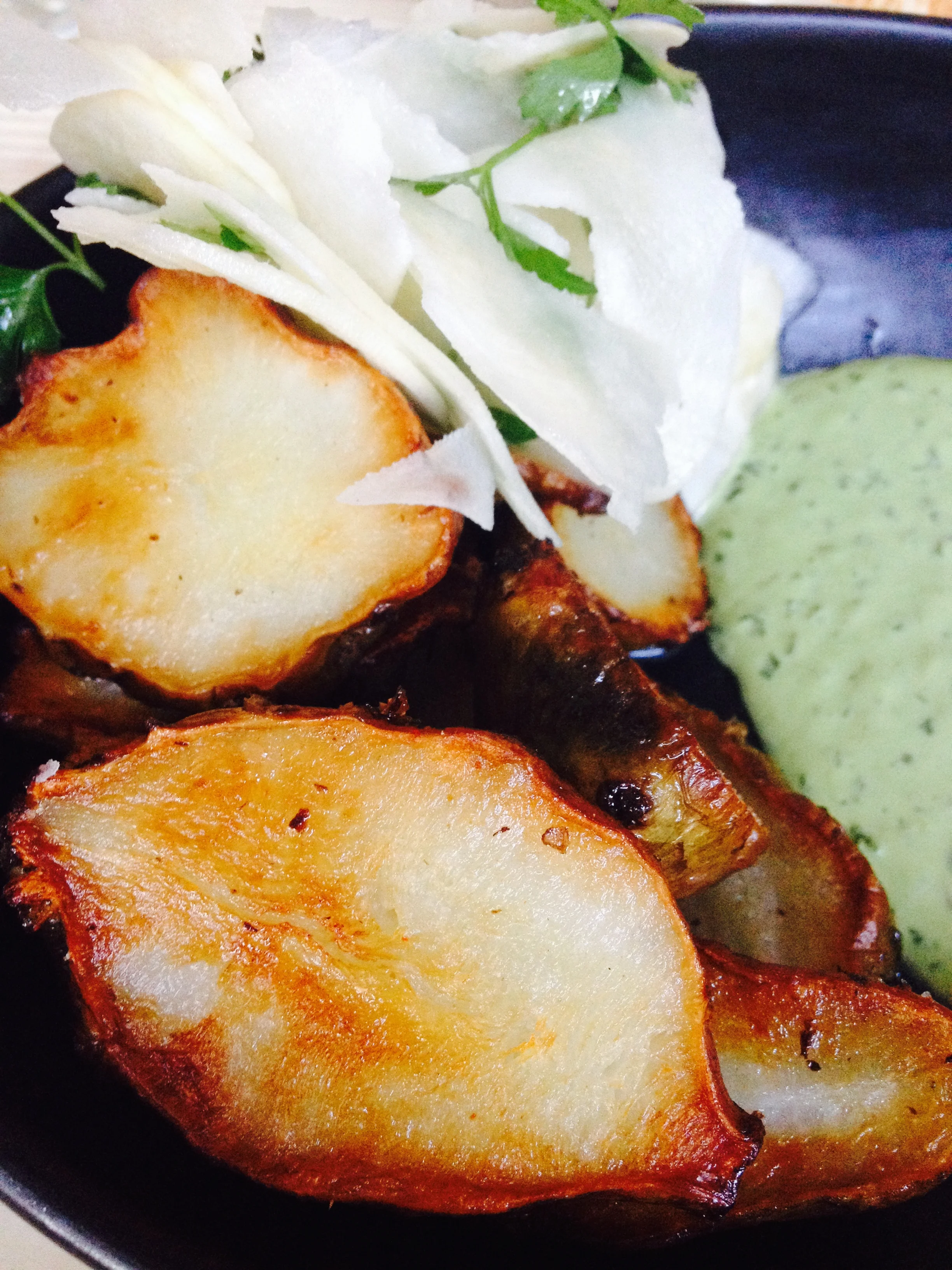 Roasted Sunchokes served with shaved raw sunchokes, flat-leaf parsley and Green Goddess dressing