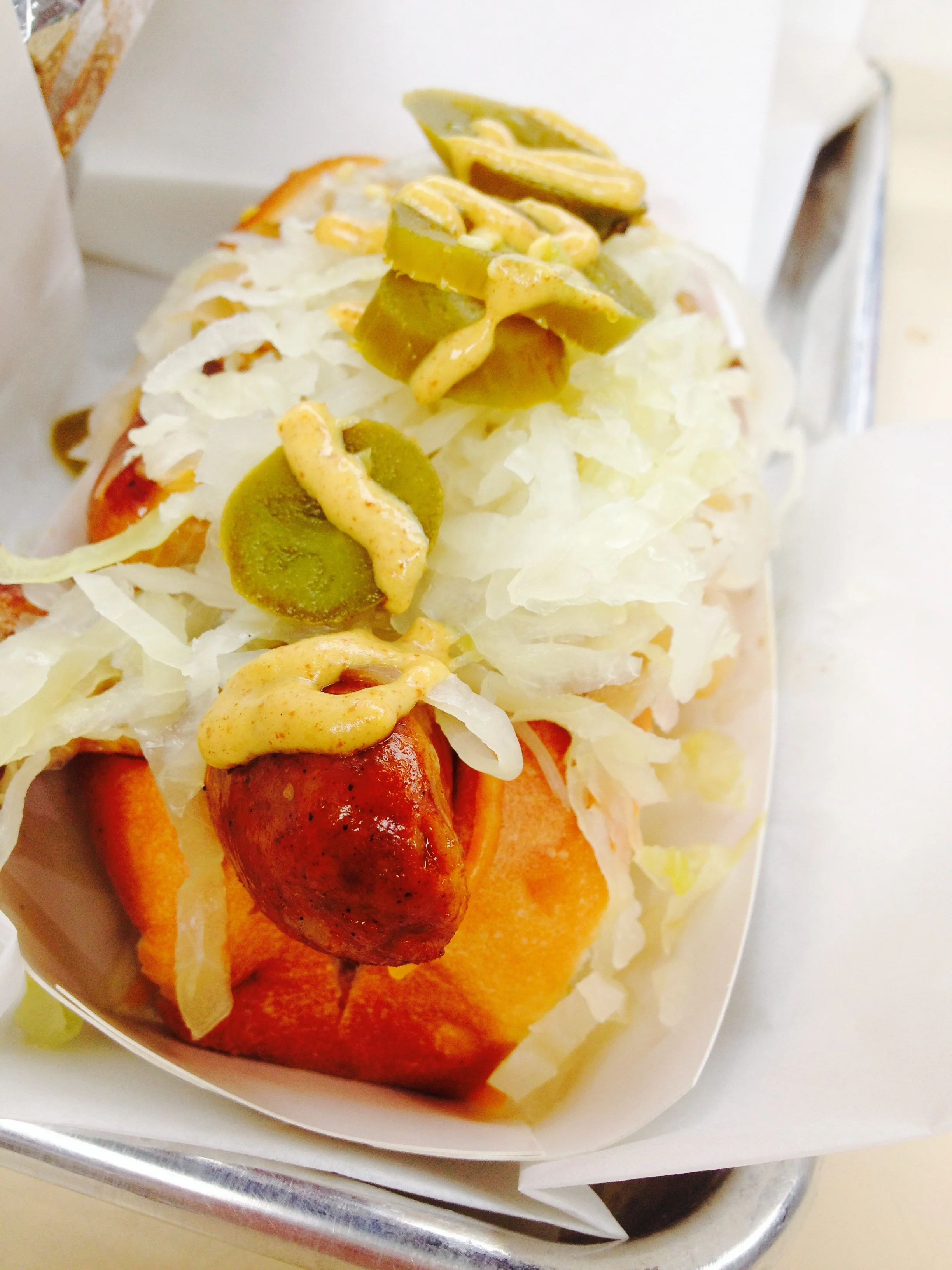 The all Beef Sauerkraut Dog on an original bun with sauerkraut with Dijon mustard (and added jalapeño s!)