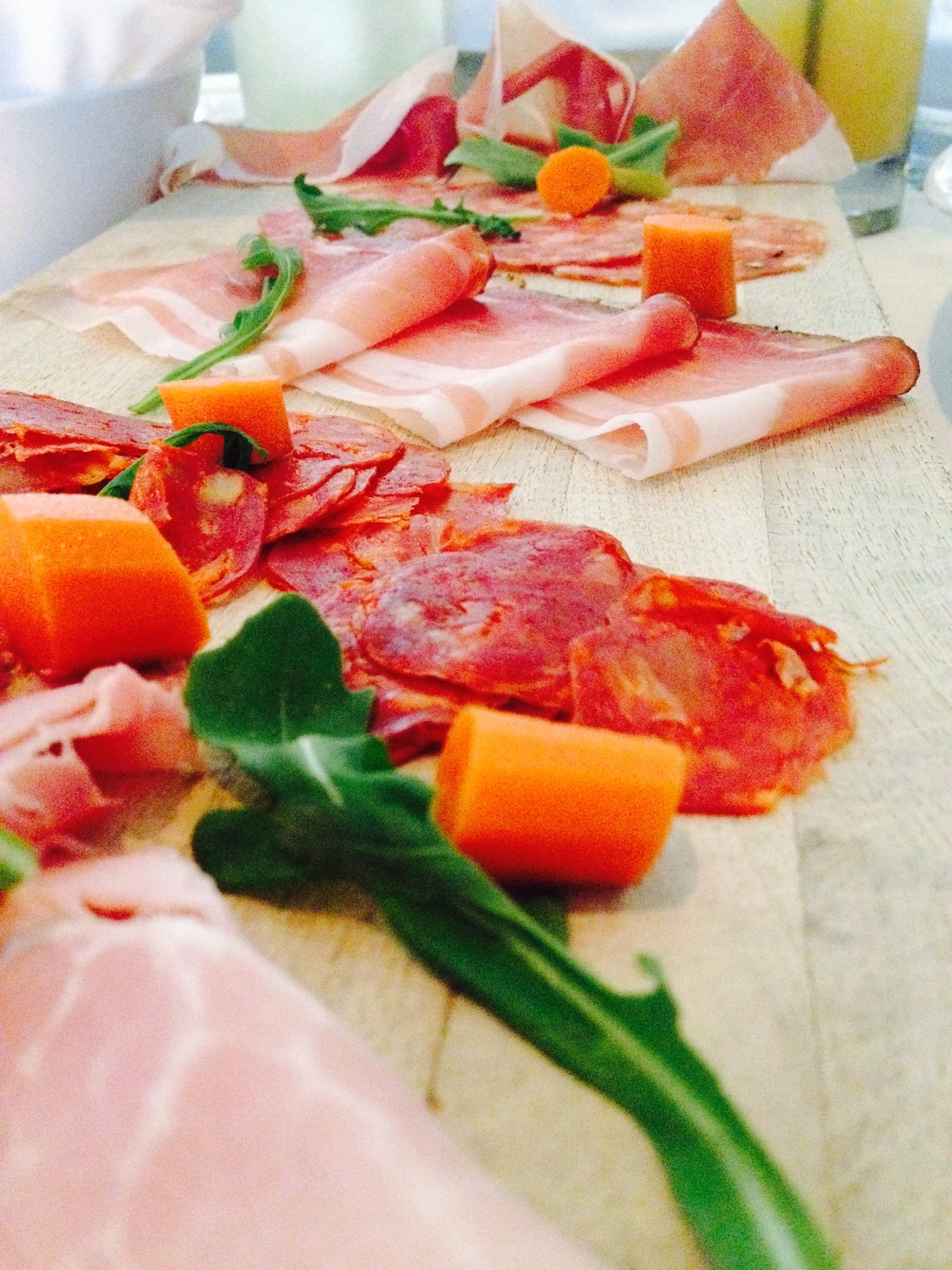 il tagliere di affettati con gnocco fritto , a house selection of charcuterie, gnocco modena style