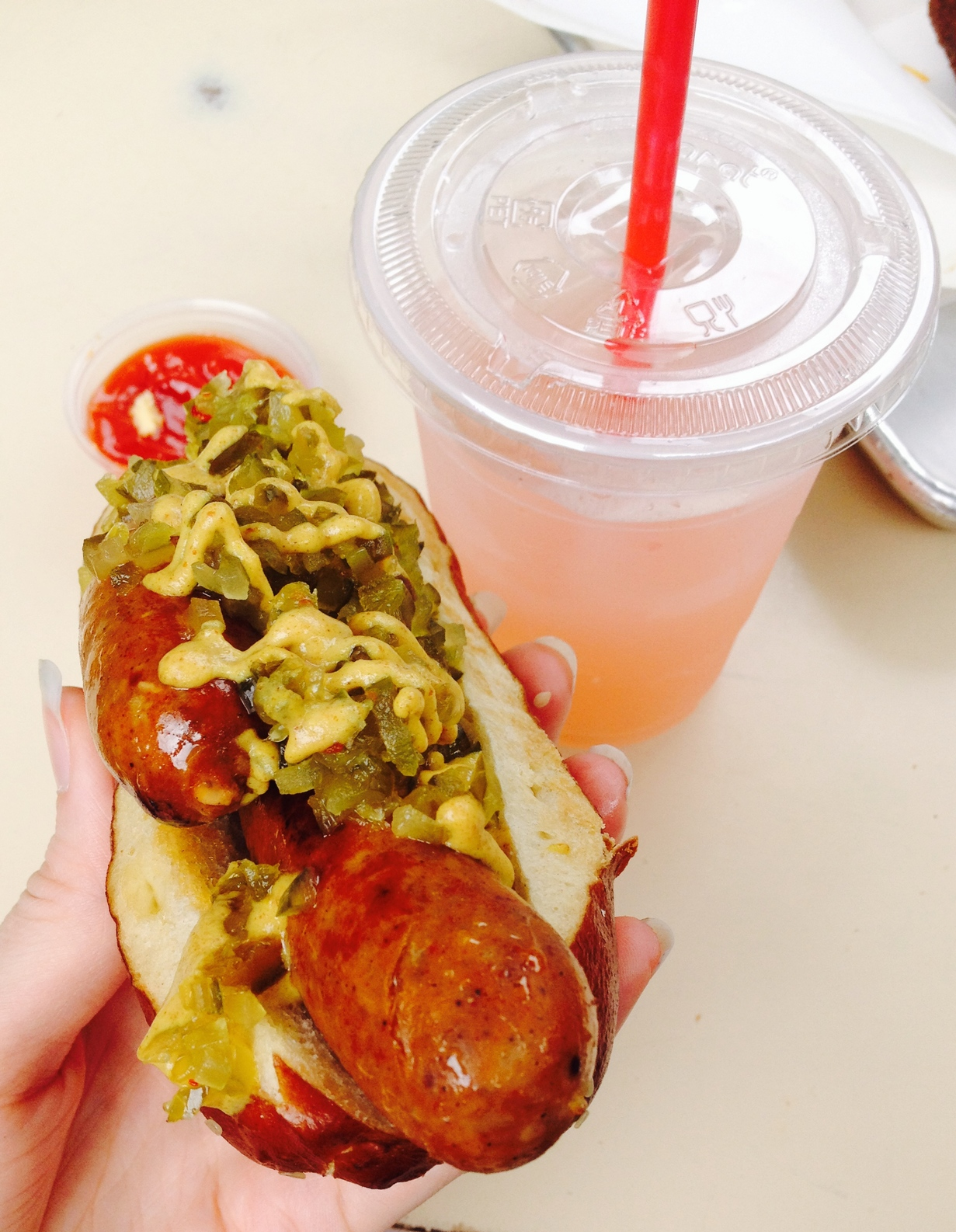 The Beef & Pork "Venice Dog" on a pretzel bun with jalapeño relish and sweet mustard.