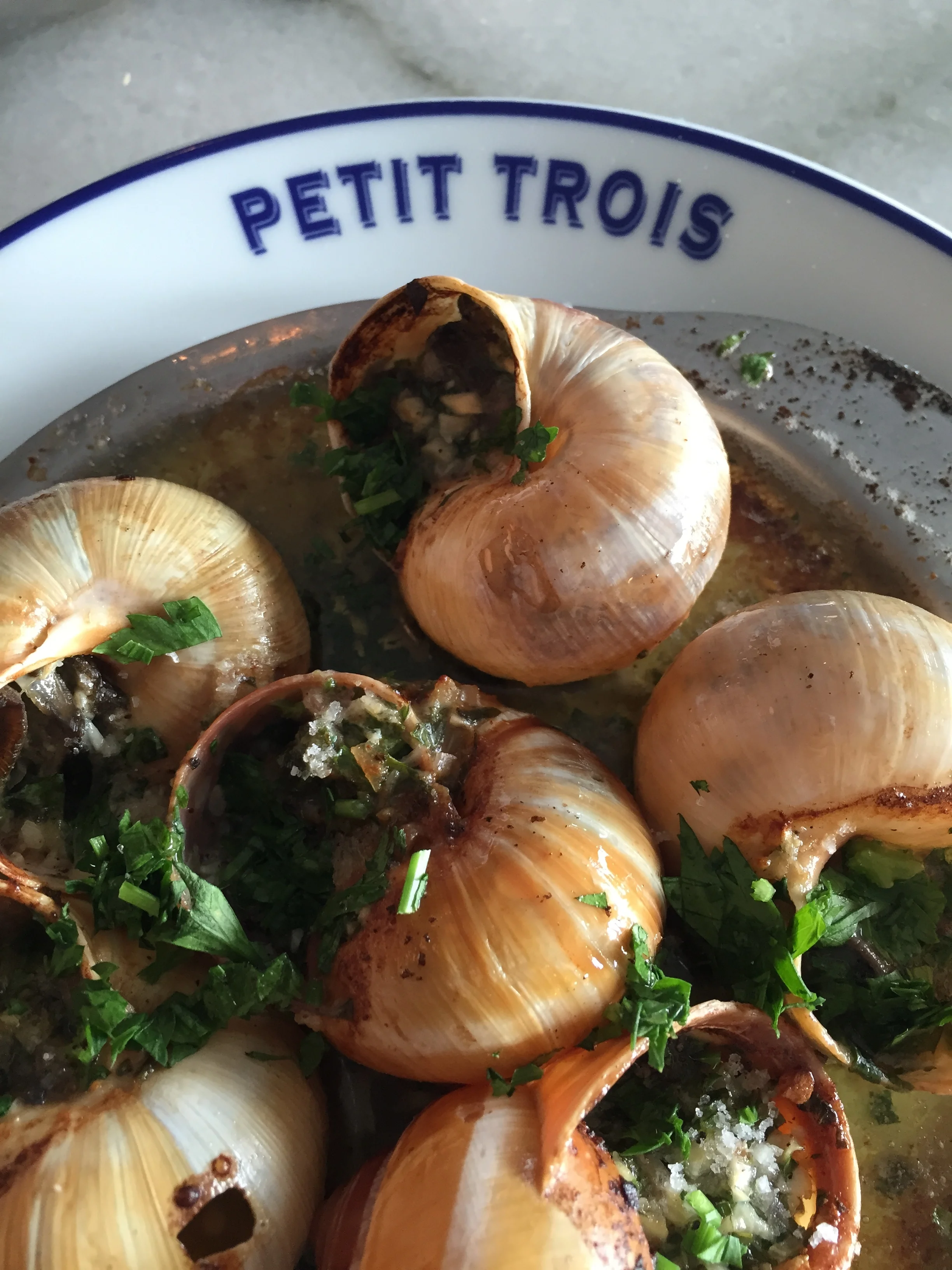 Burgundy Escargots with garlic and parsley butter.