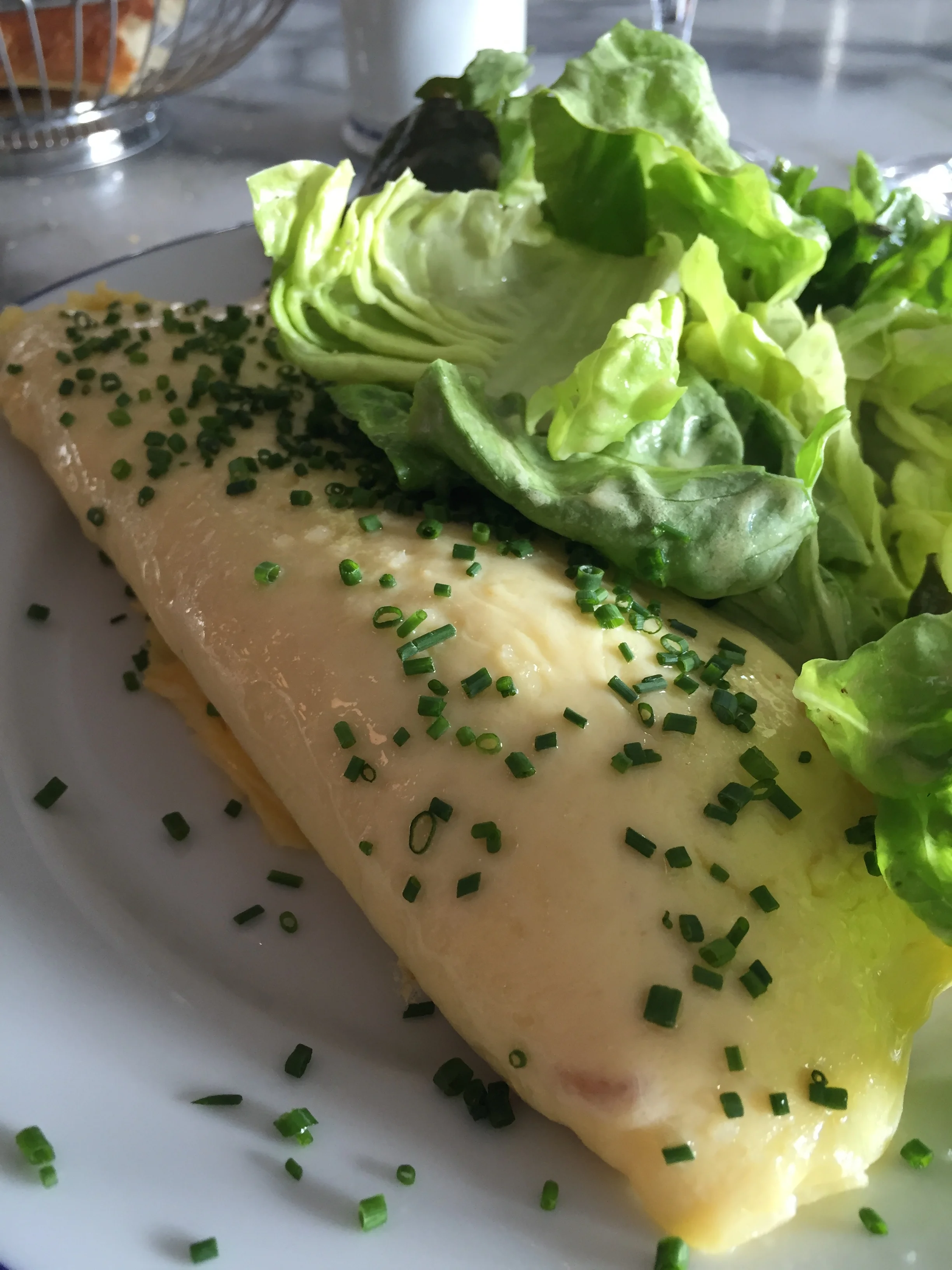 Omelette with Boursin cheese and chives.