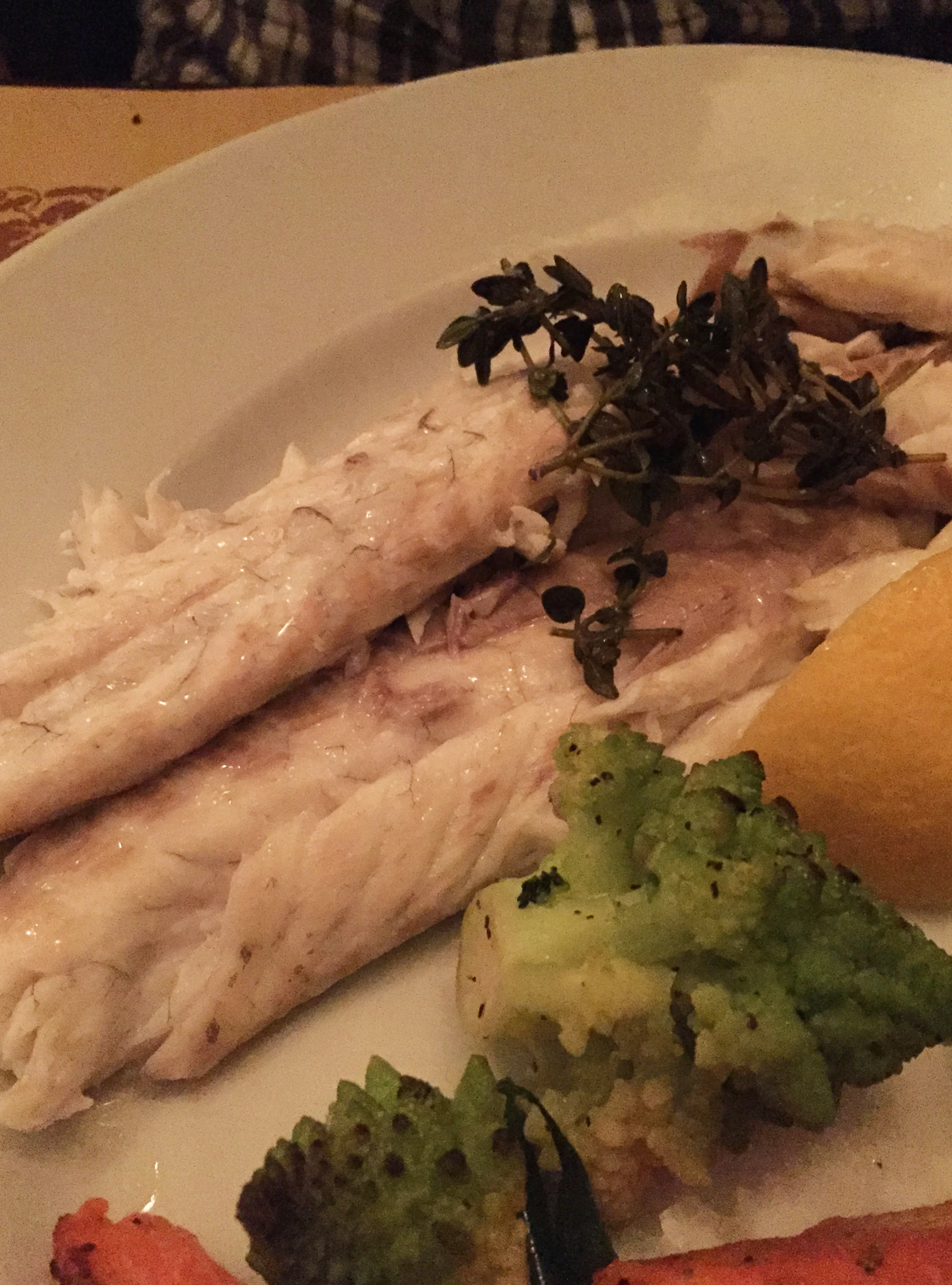 Whole branzino, roasted in sea salt, aromatic herbs, sauteed mixed vegetables 