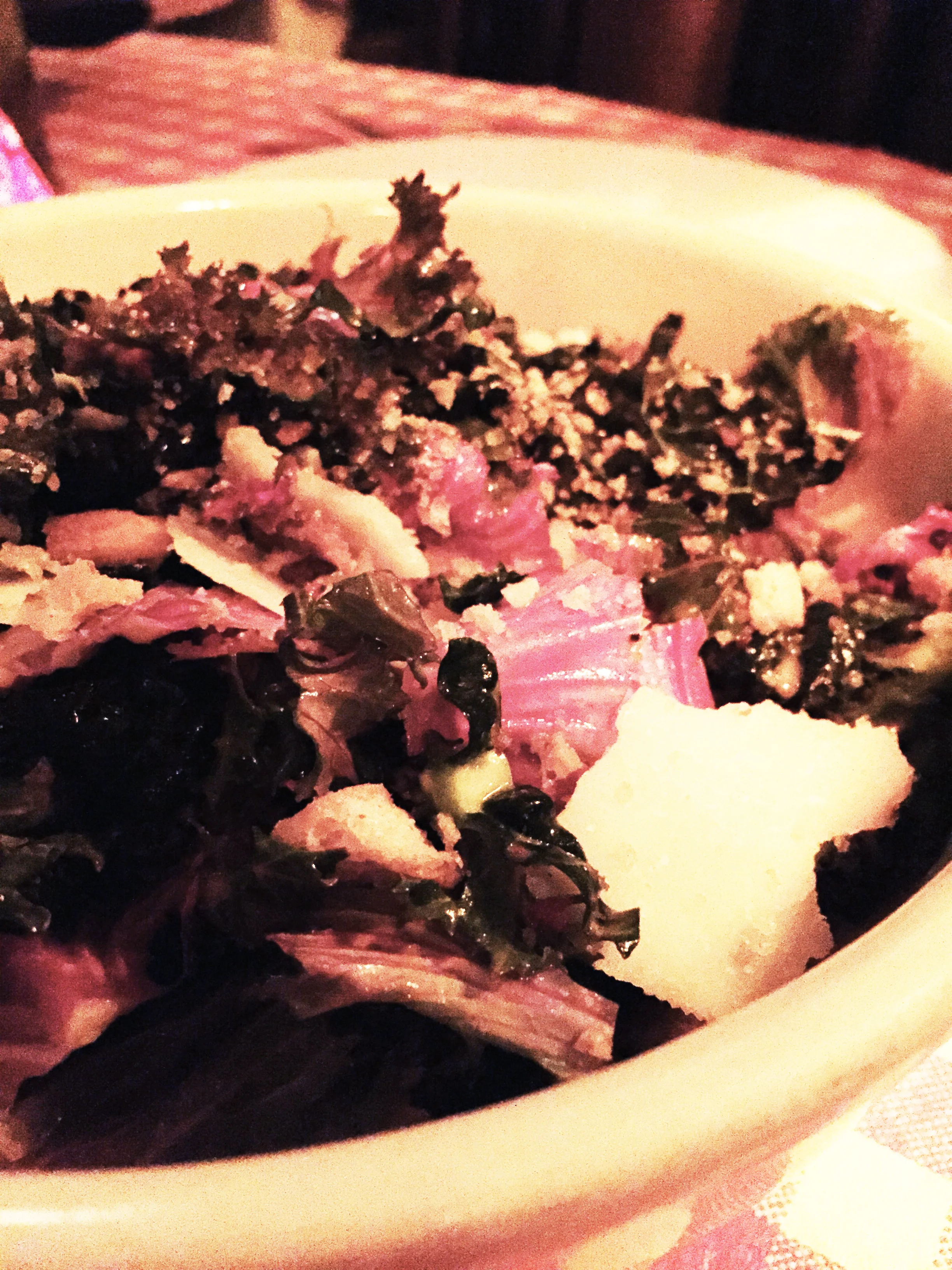 Kale Caesar with Tuscan and Red Russian kale, parmigaiano, garlic, croutons, and anchovy-caesar dressing.