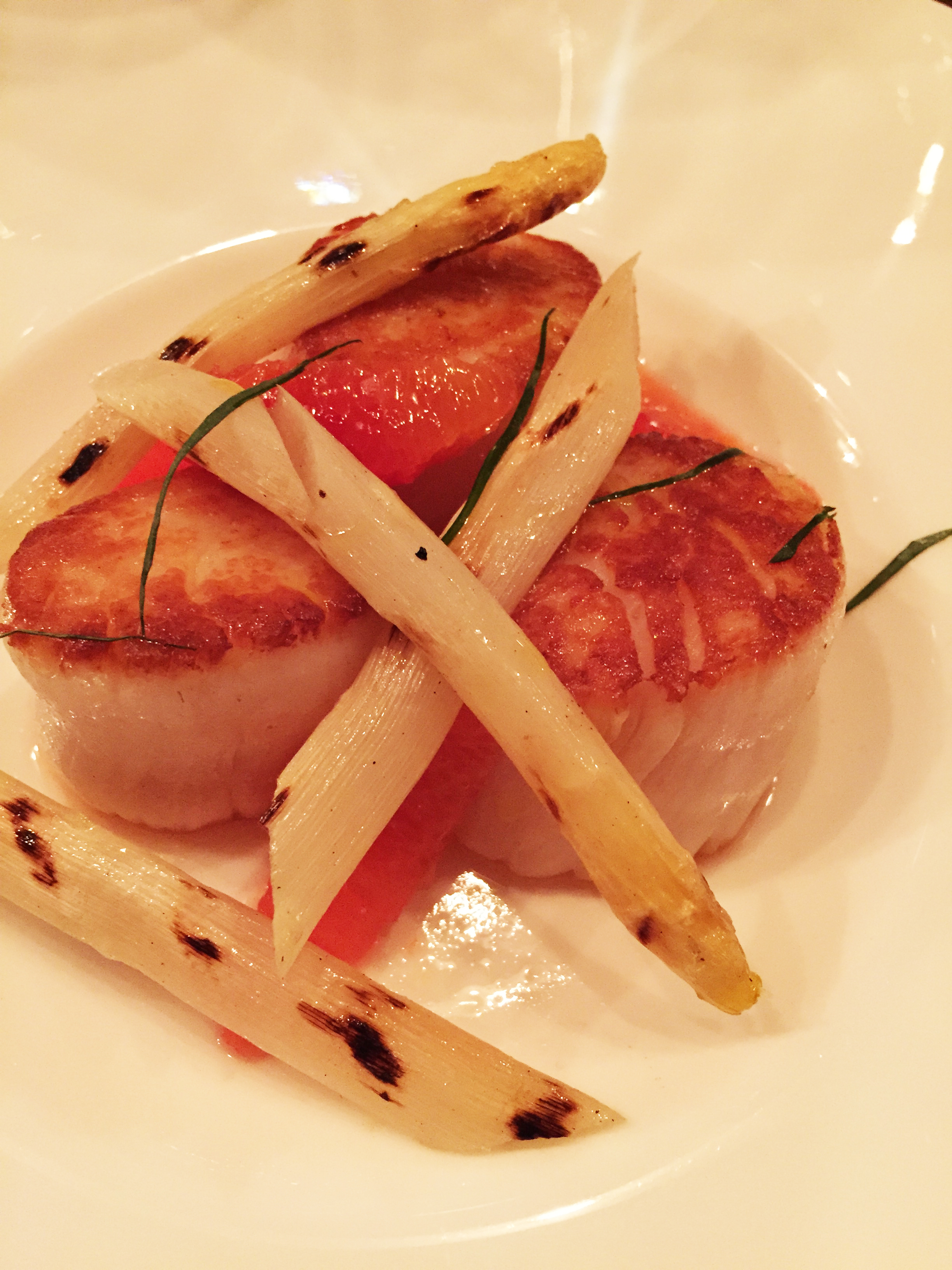 Scallops with blood orange and white asparagus.