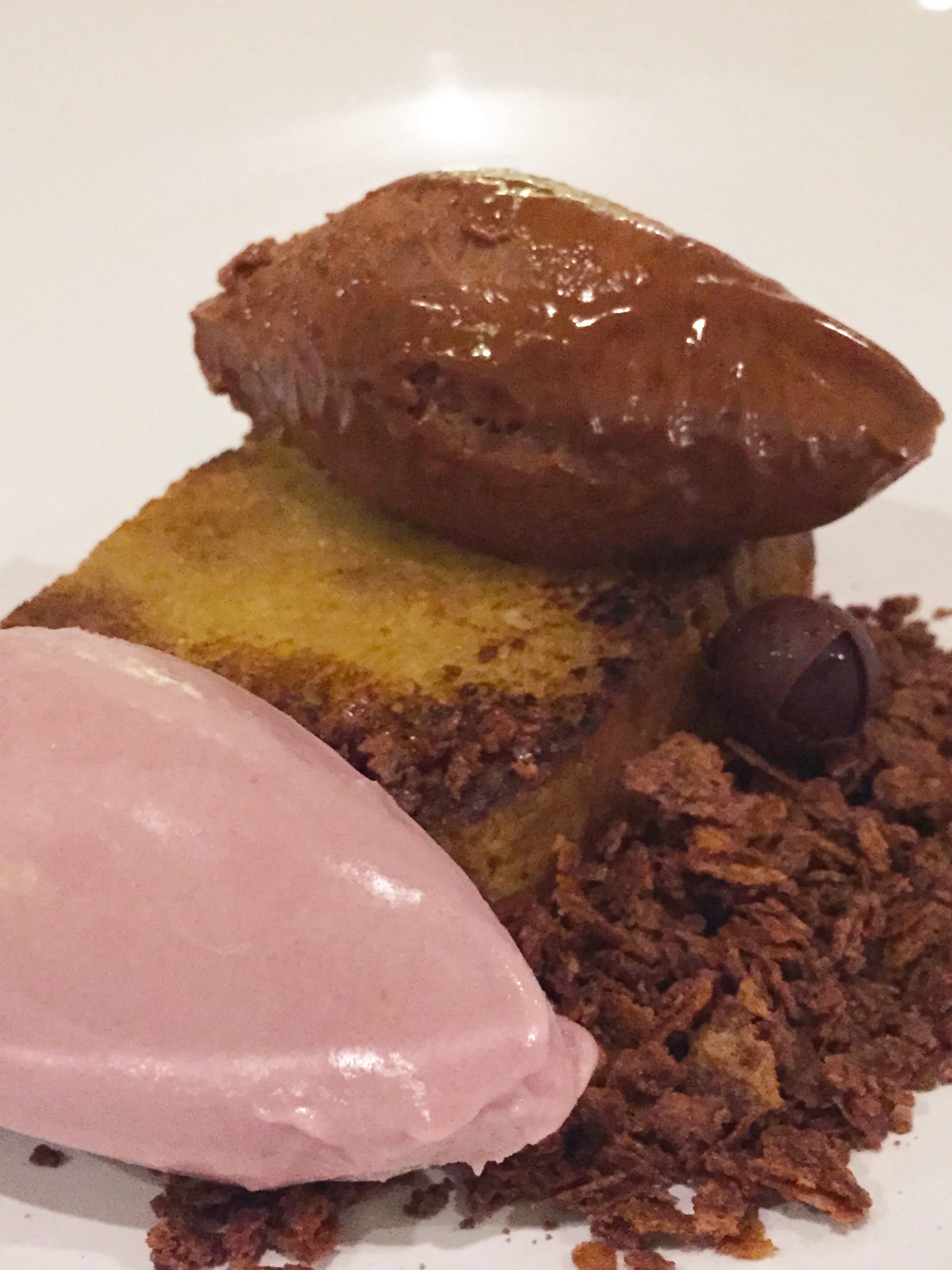 PB&J Remixed with peanut butter ganache, roasted grape ice cream, griddled pound cake and chocolate feuilletine.