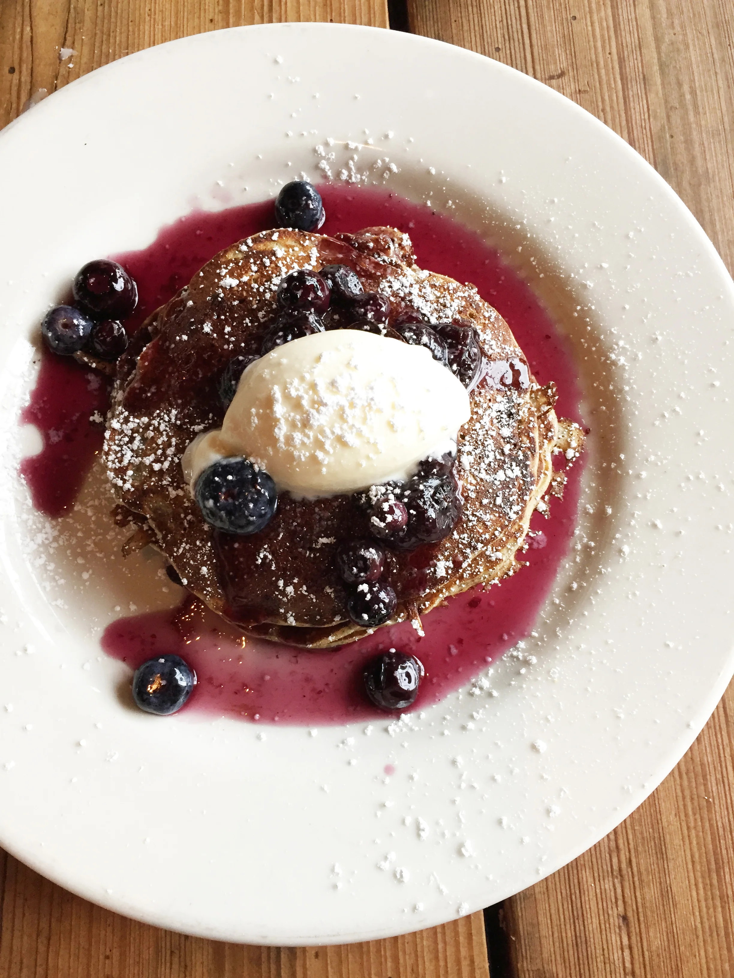 Lemon Buckwheat Pancakes with blueberry compote and crème fraîche.