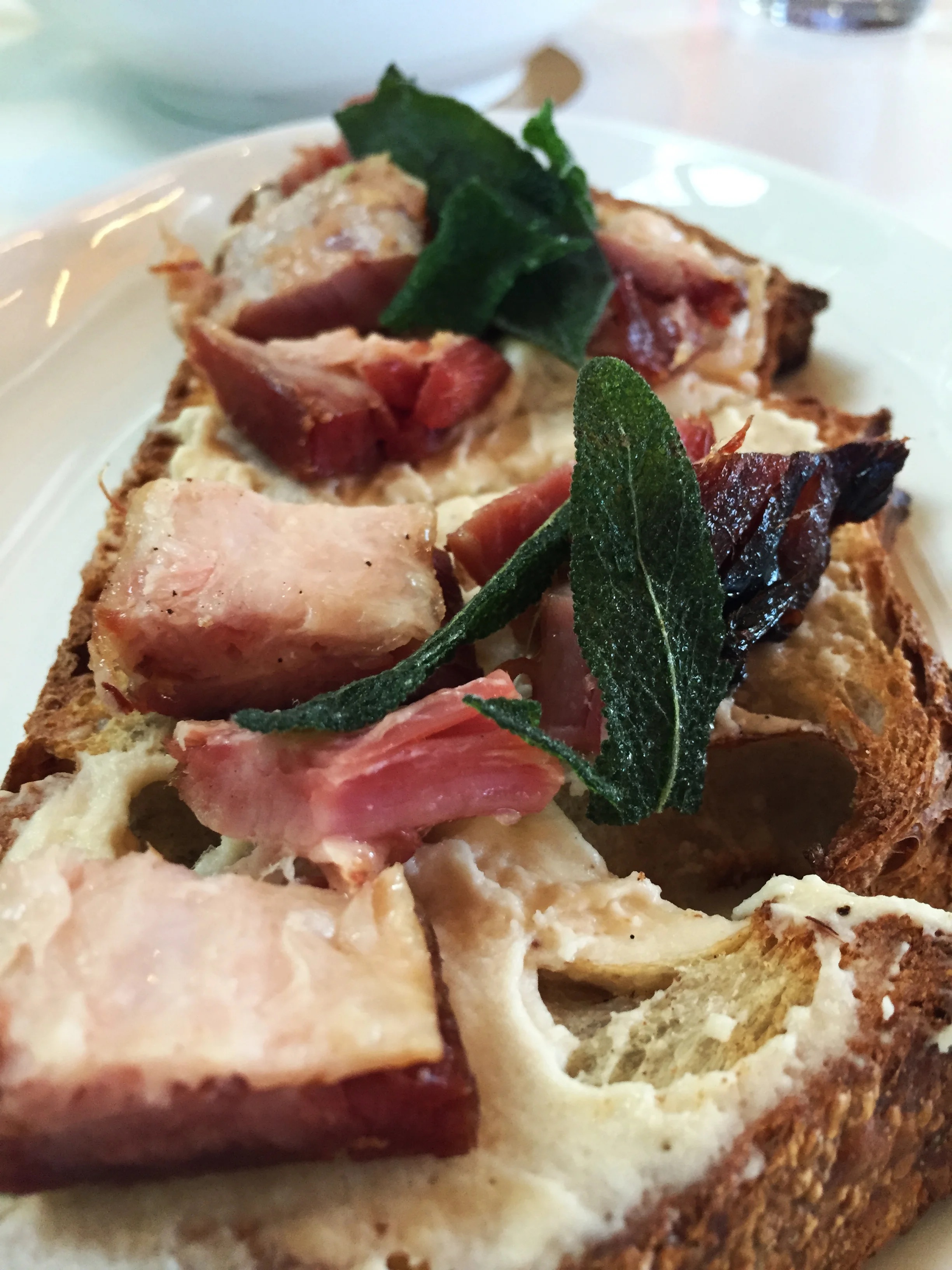 Maple Custard Toasty with bacon confit and crispy sage.