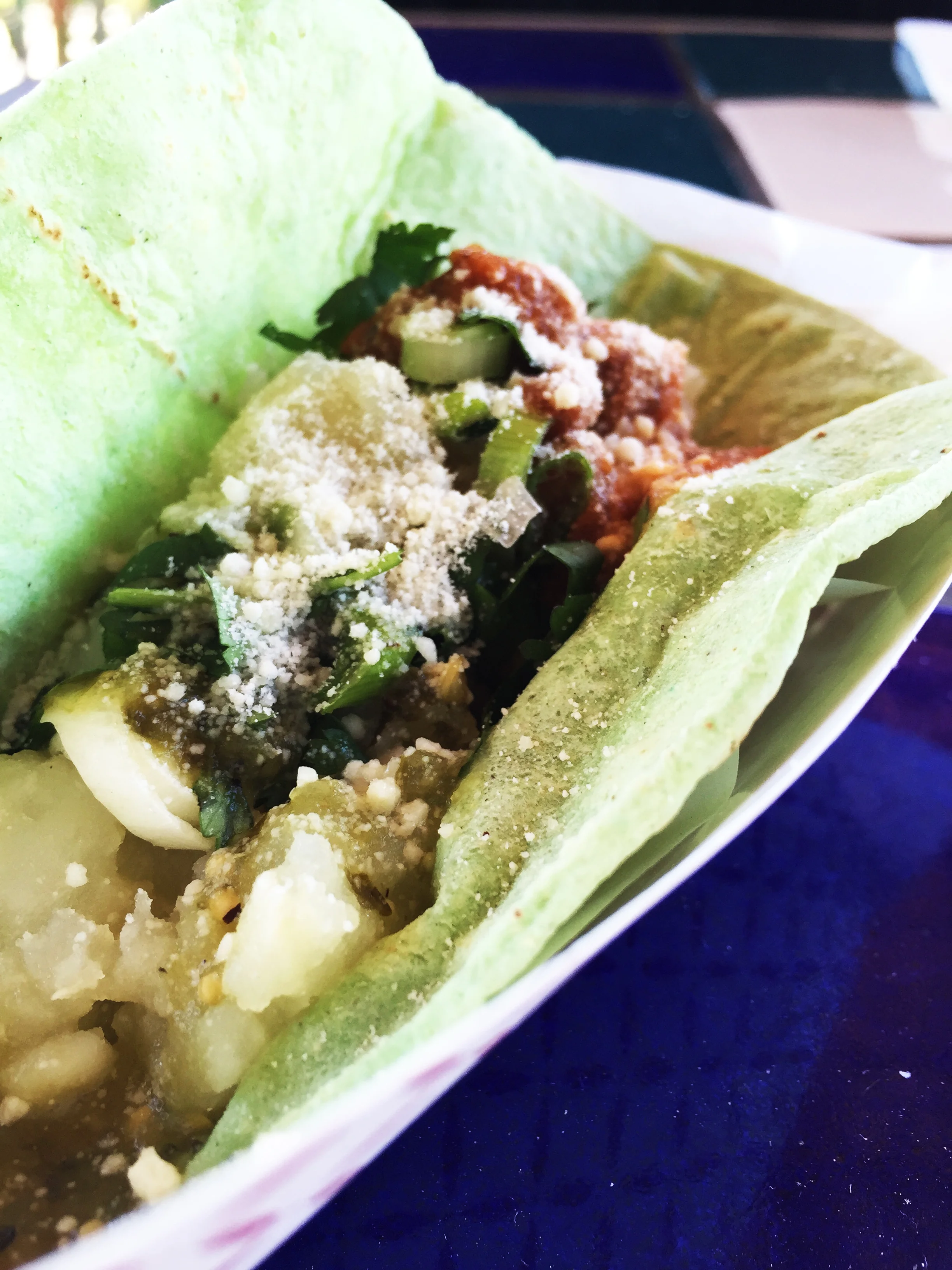 Papa Taco with potatoes, onion, garlic, cilantro, and chile verde.