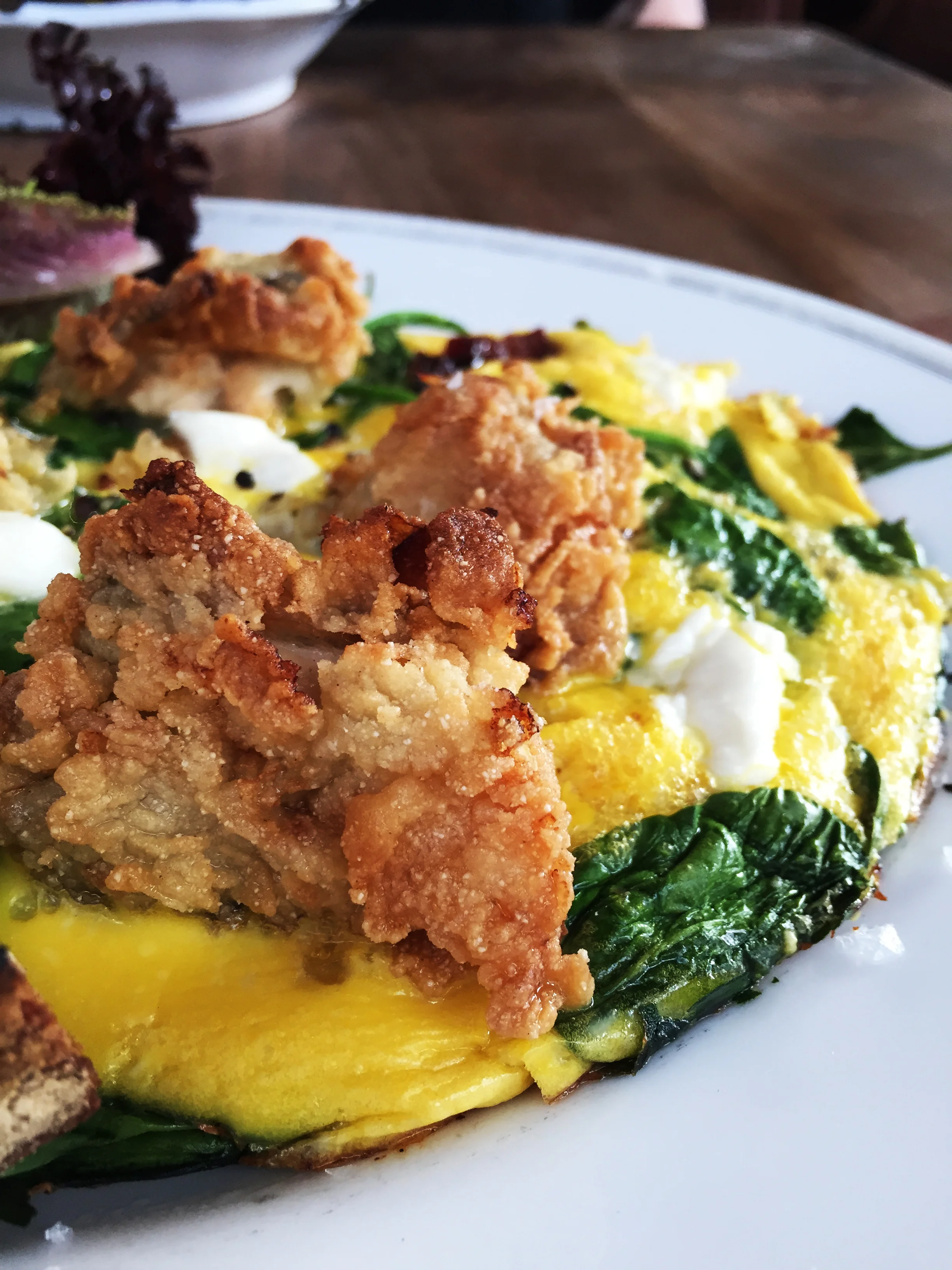 Fried Oyster Frittata with Spinach and Bacon.
