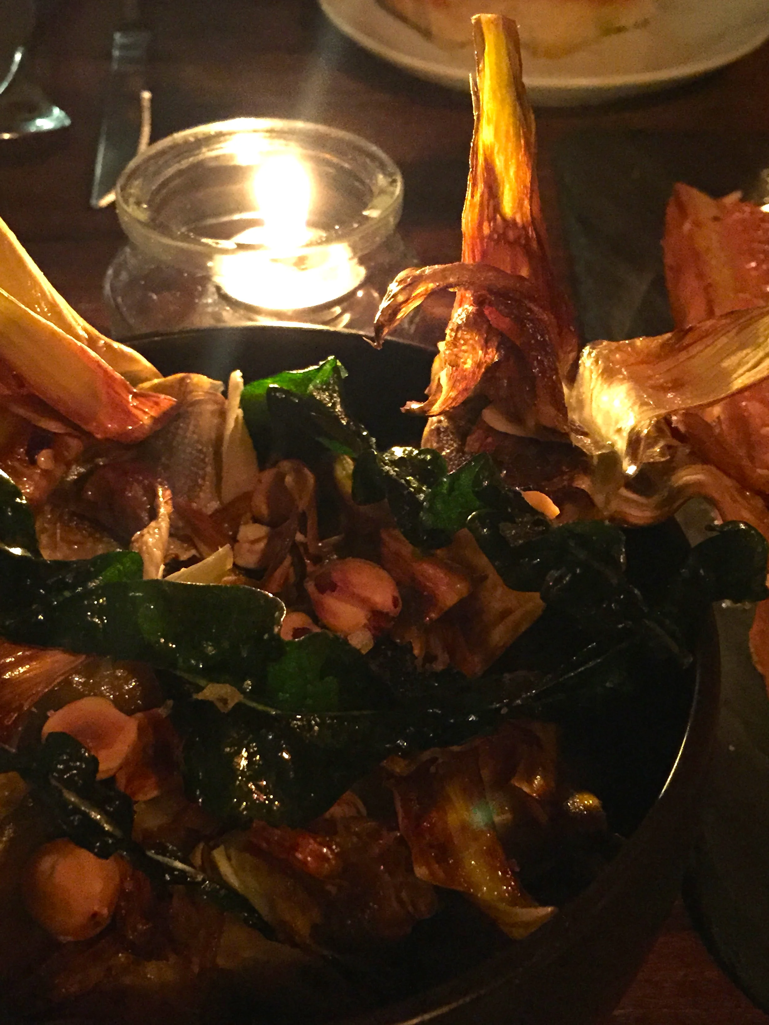 CARXOFES - caramelized globe artichokes and collard kohlrabi, hazelnuts, garlic, and spicy chili