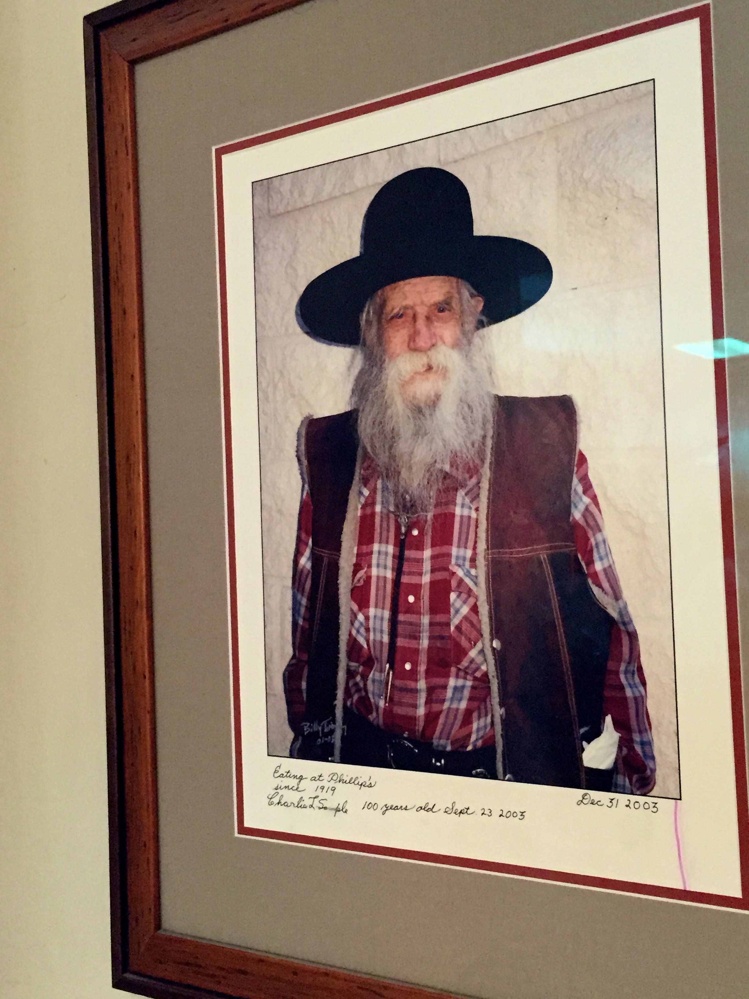 "Eating at Philippe's since 1919. Charlie L. Sample. 100 years old Sept 23, 2003." 
