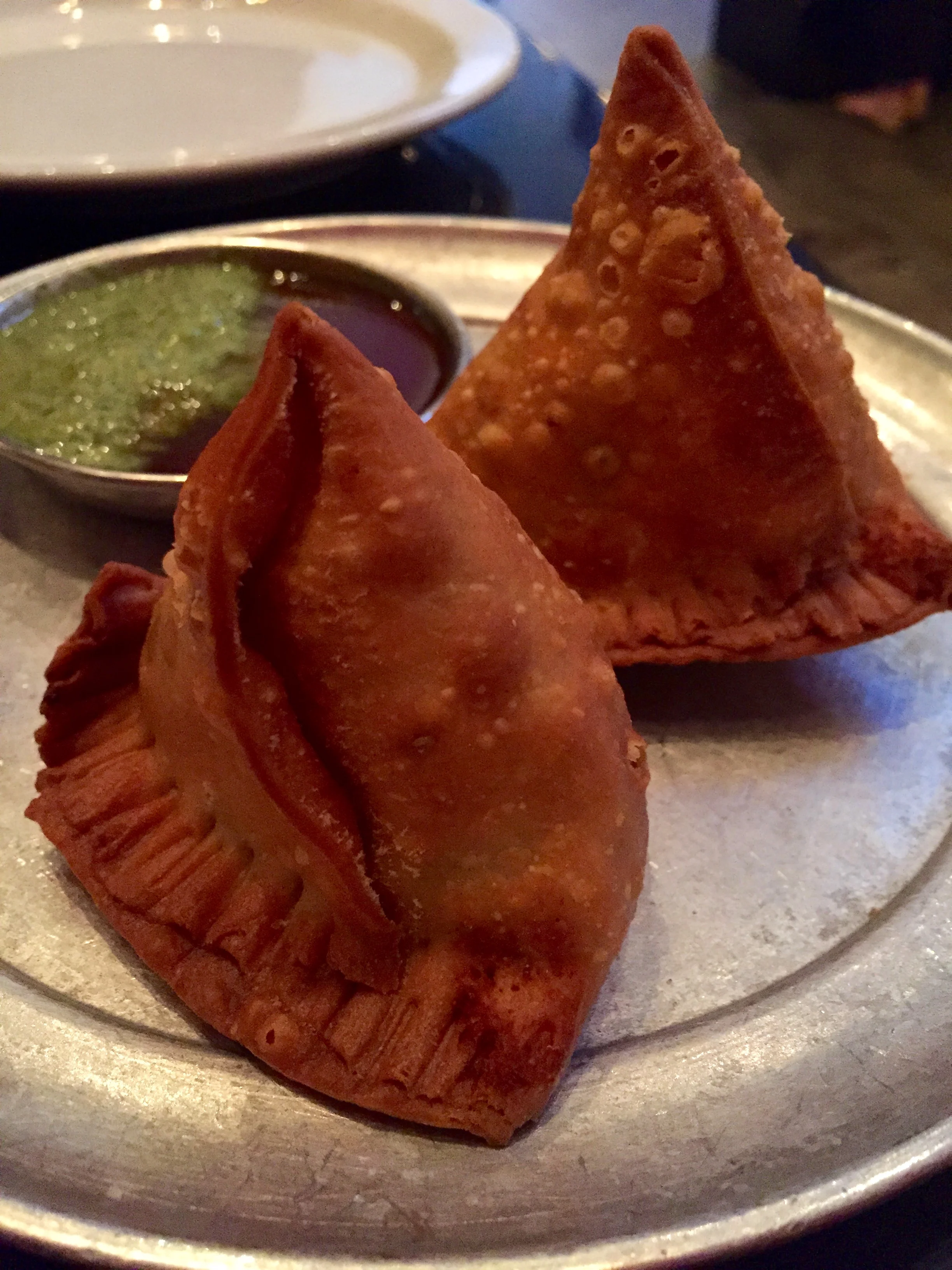 Butter Chicken Samosas with Indian Curry.