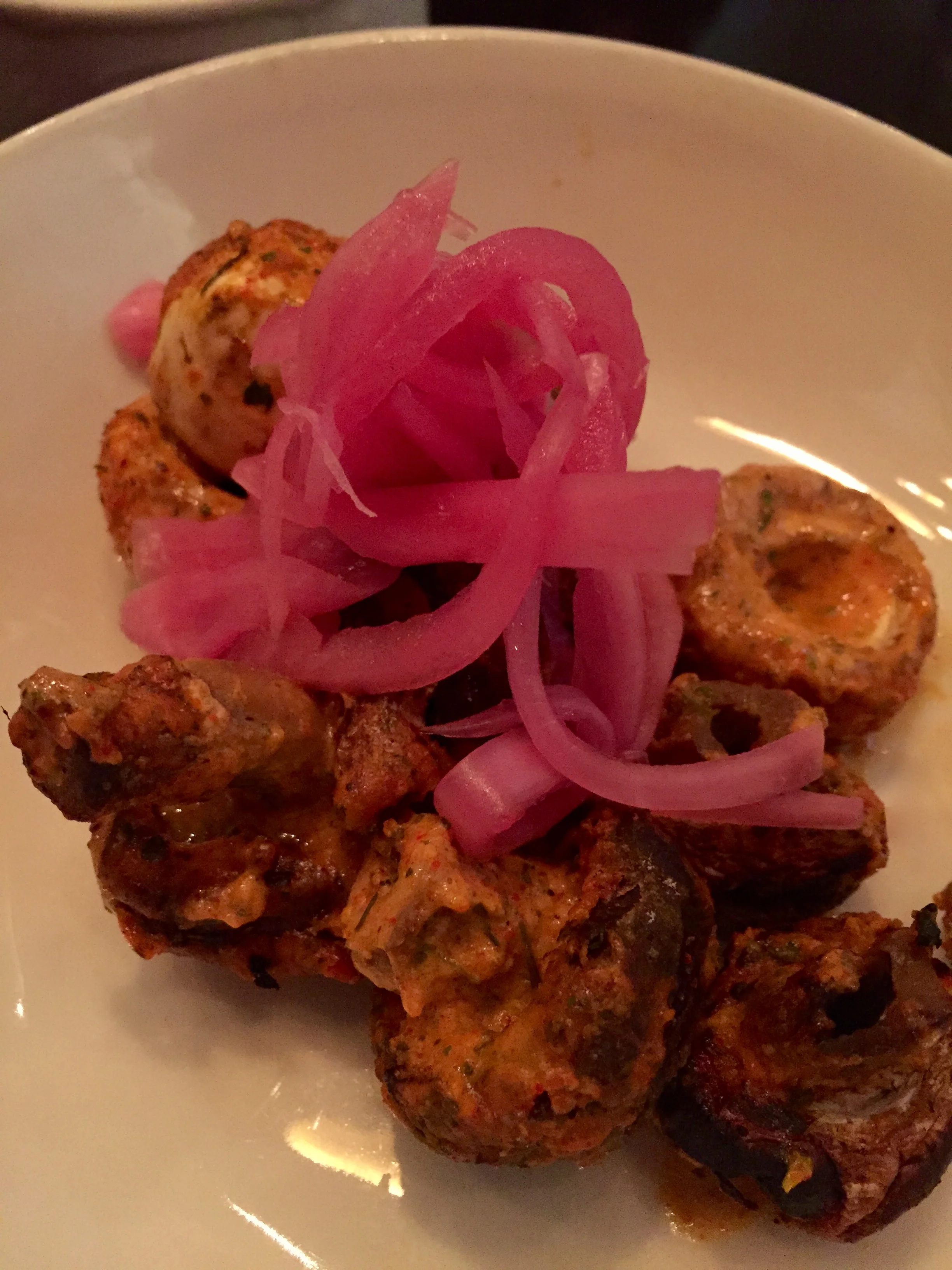 Mixed Mushroom Tandoori in classic tandoori masala, slightly charred and juicy.