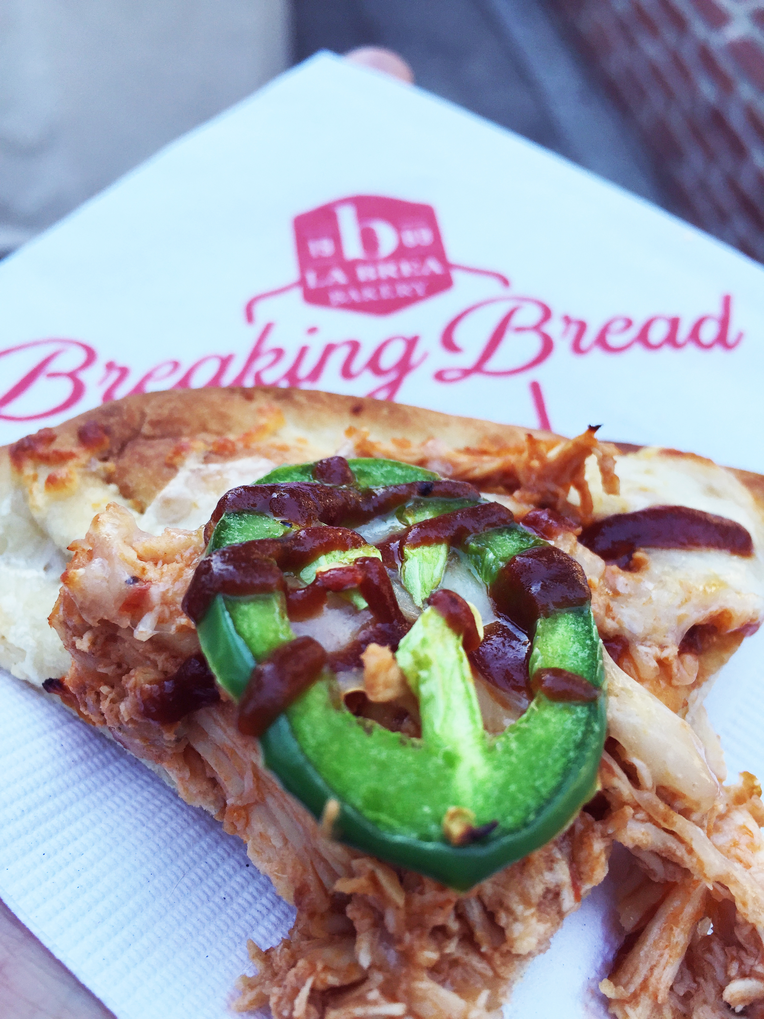 Barbecue "ChickNan" with red onion, smoked mozzarella, and jalapeño.